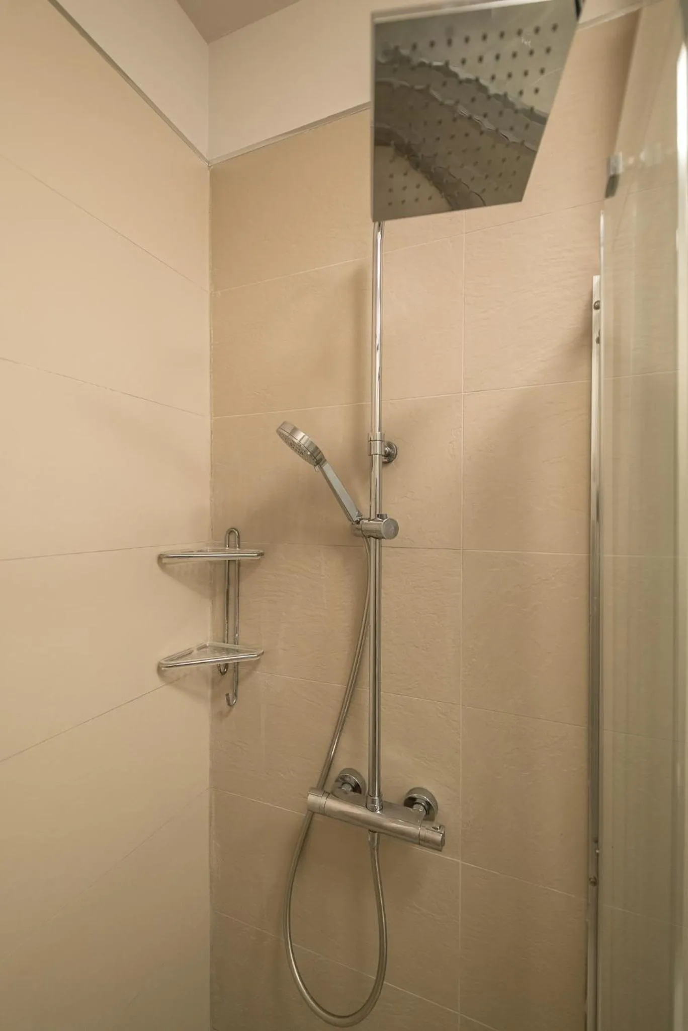 Shower in Expecto Apartments