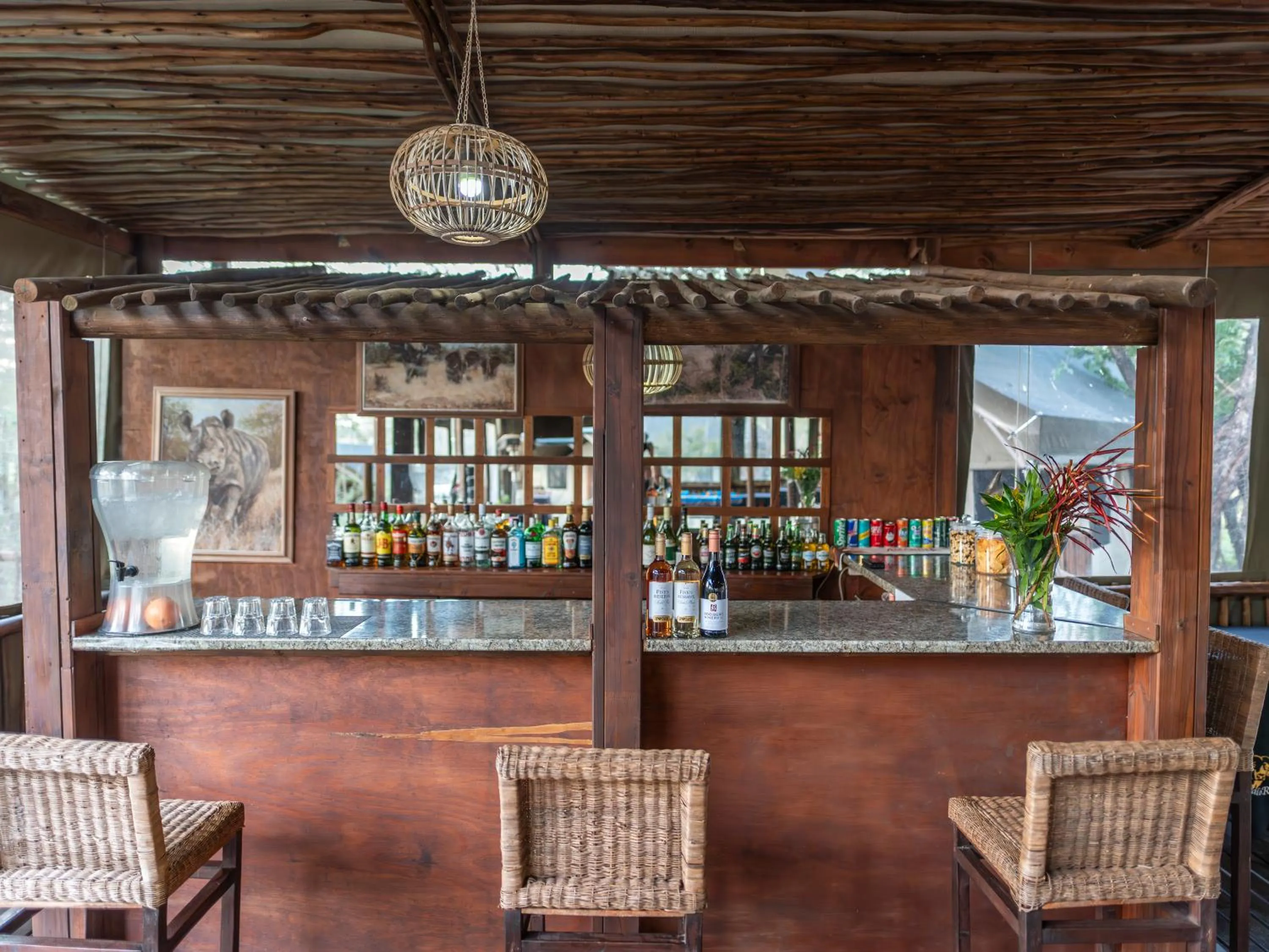 Lounge or bar in Buffalo Rock Tented Camp