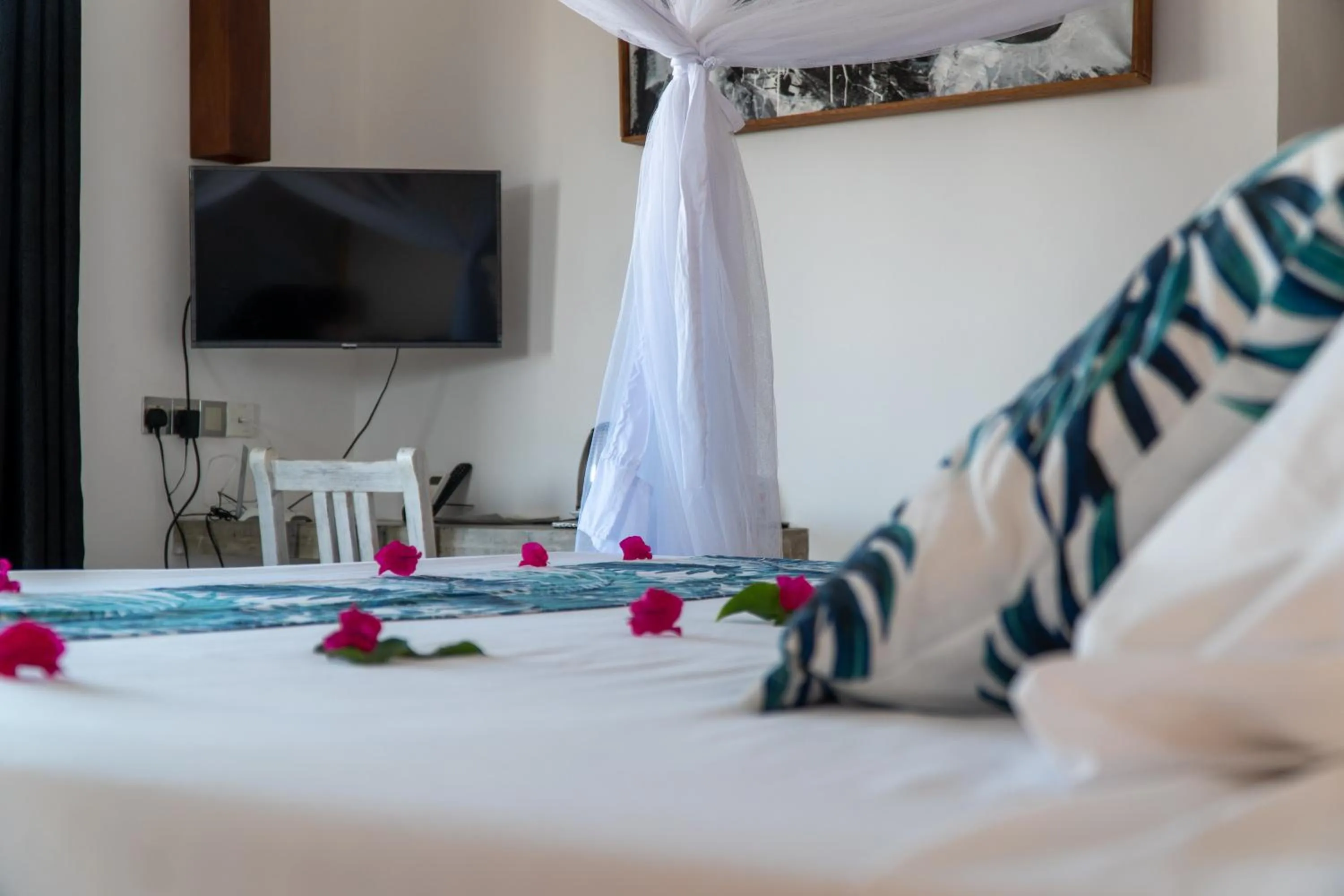 Photo of the whole room, Bed in Visiwa Beach Resort