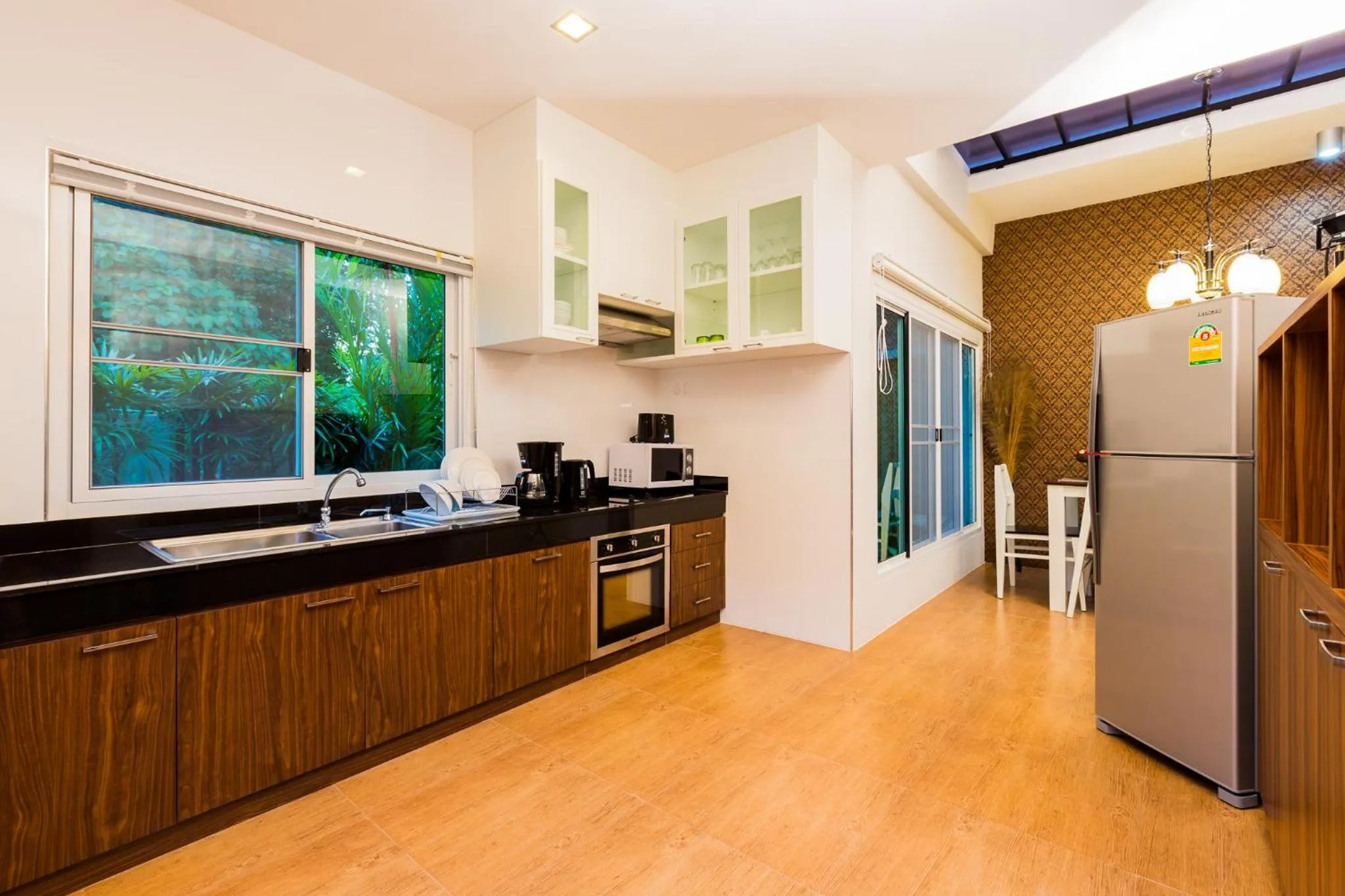 Kitchen or kitchenette in Irawan House