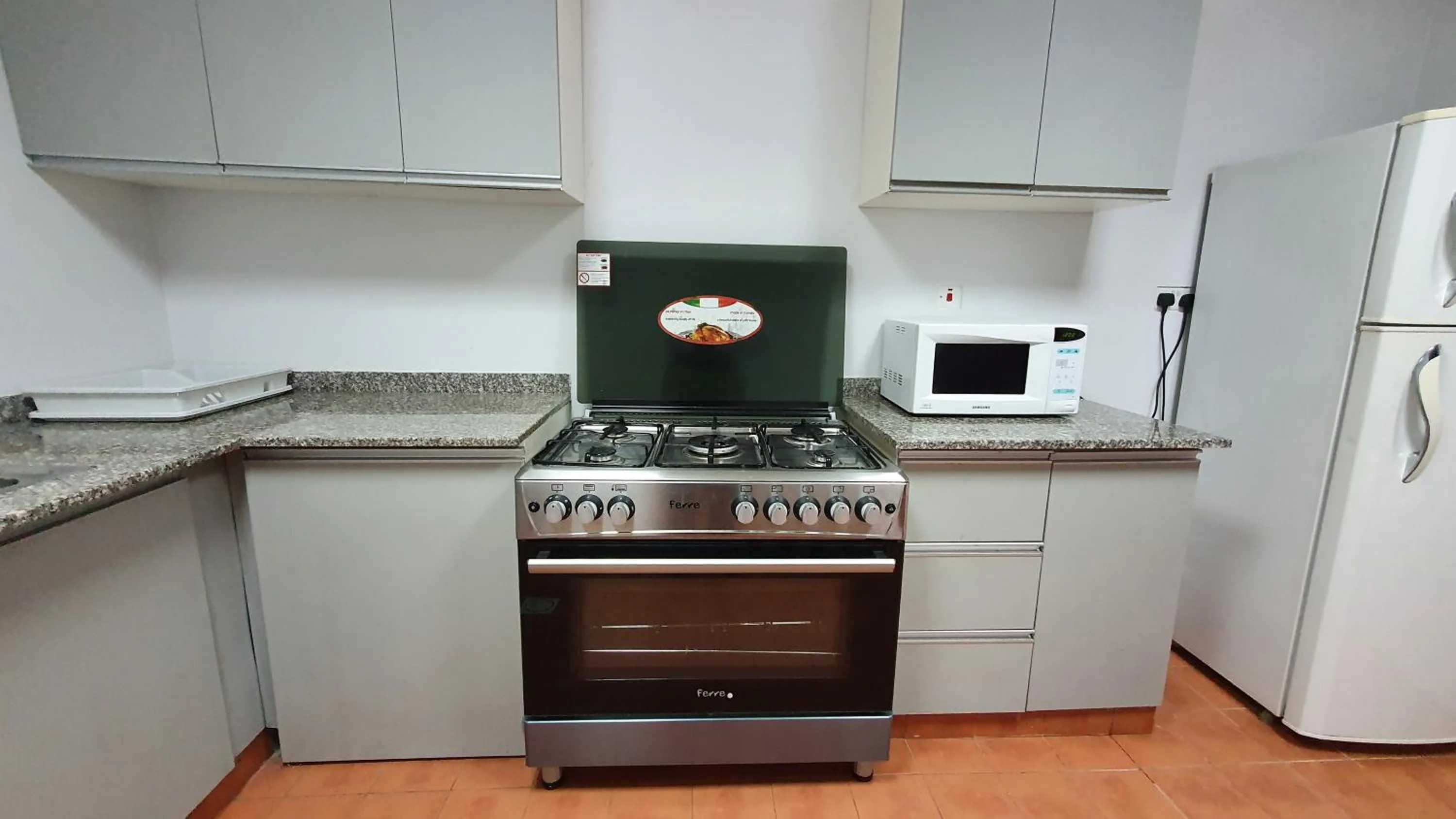 Kitchen or kitchenette in Muscat Oasis Residences