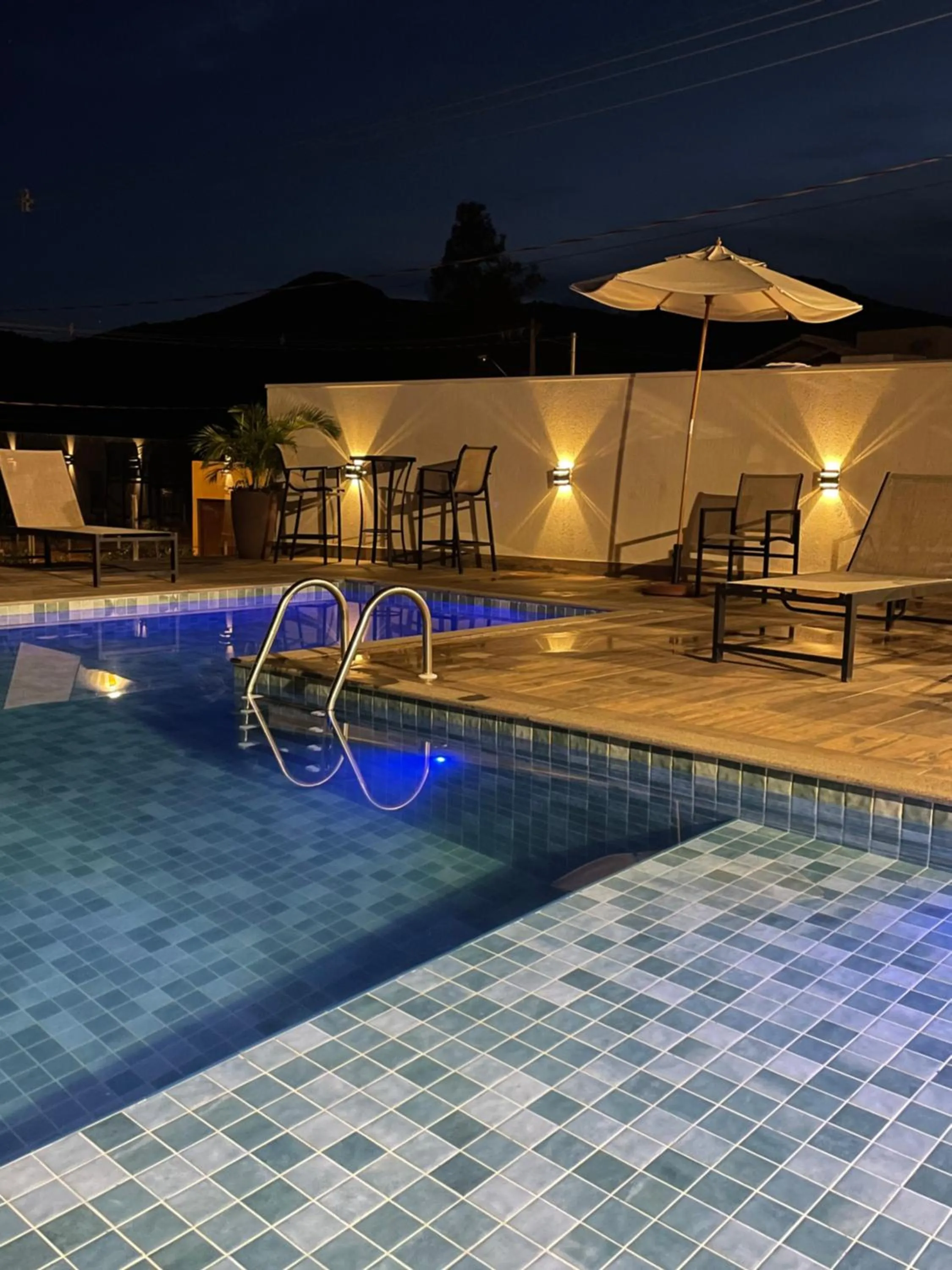 Swimming pool in Pousada Viver Capitólio