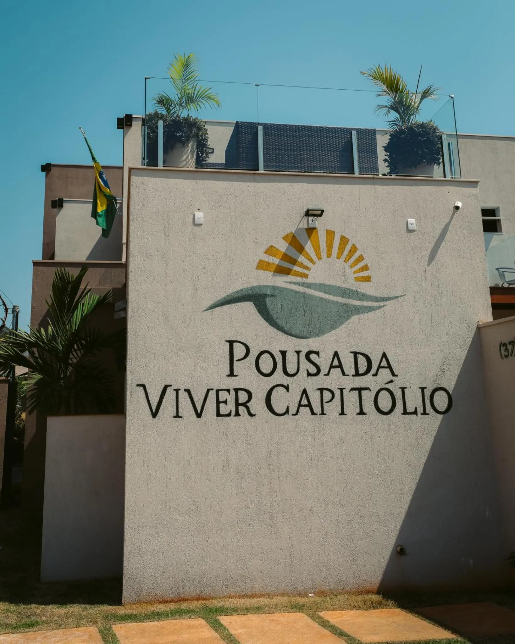 Property logo or sign in Pousada Viver Capitólio