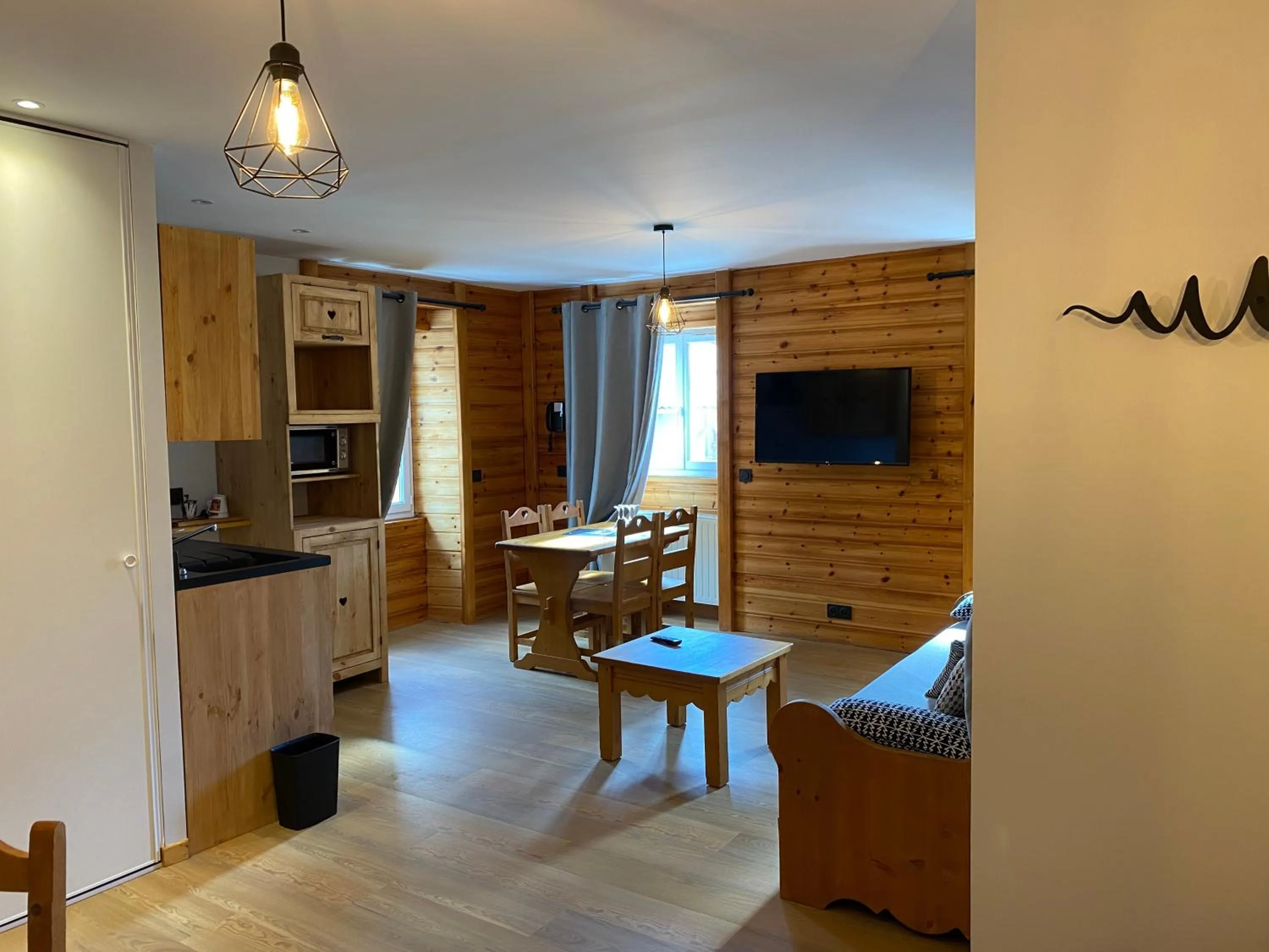 Kitchen or kitchenette in Logis Hôtel & Spa Les Autanes