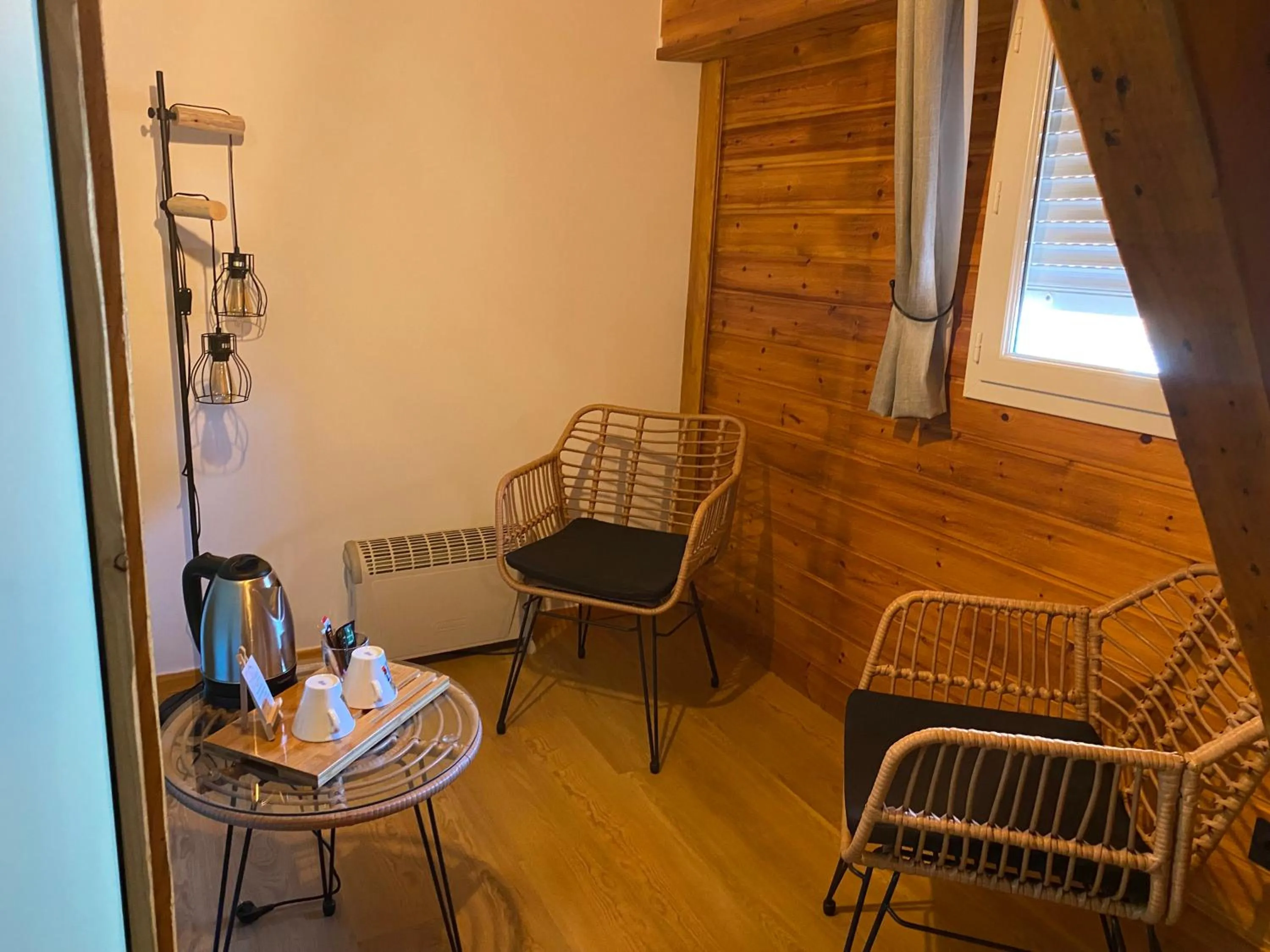 Seating area in Logis Hôtel & Spa Les Autanes