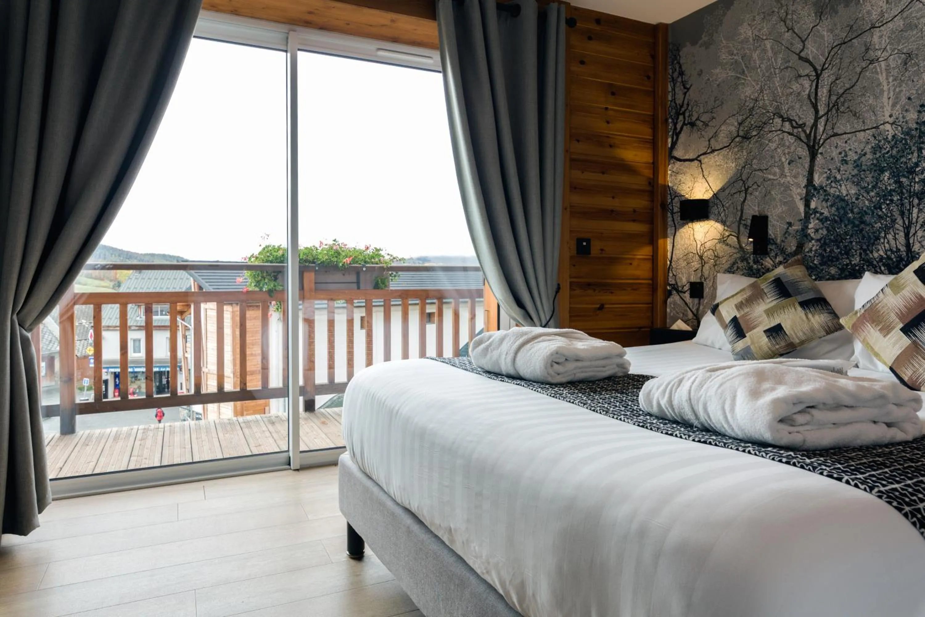 Bedroom, Bed in Logis Hôtel Les Autanes & Spa