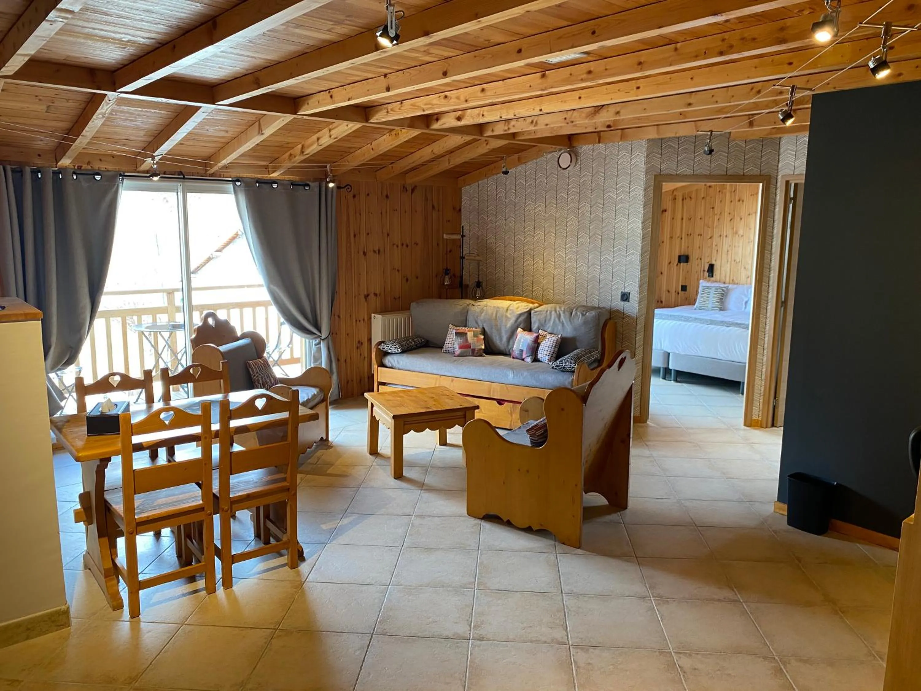 Living room, Bed in Logis Hôtel & Spa Les Autanes