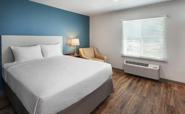 Bed in WoodSpring Suites Lackland near Sea World