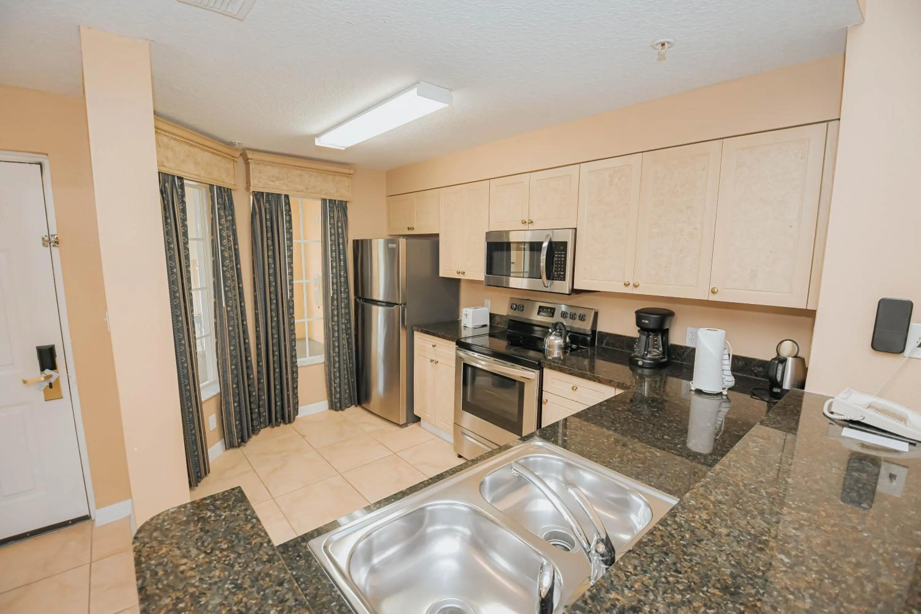 kitchen in WorldQuest Orlando Resort