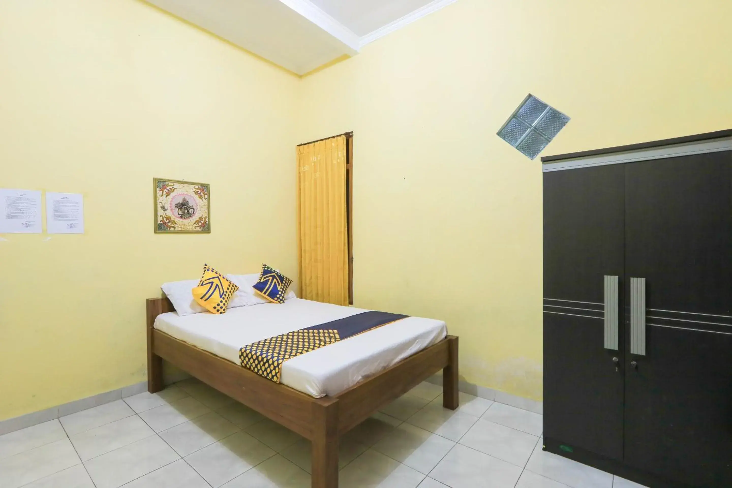 Bedroom in Hotel O Wallet Family Residence Syariah Bedroom in Hotel O Wallet Family Residence Syariah