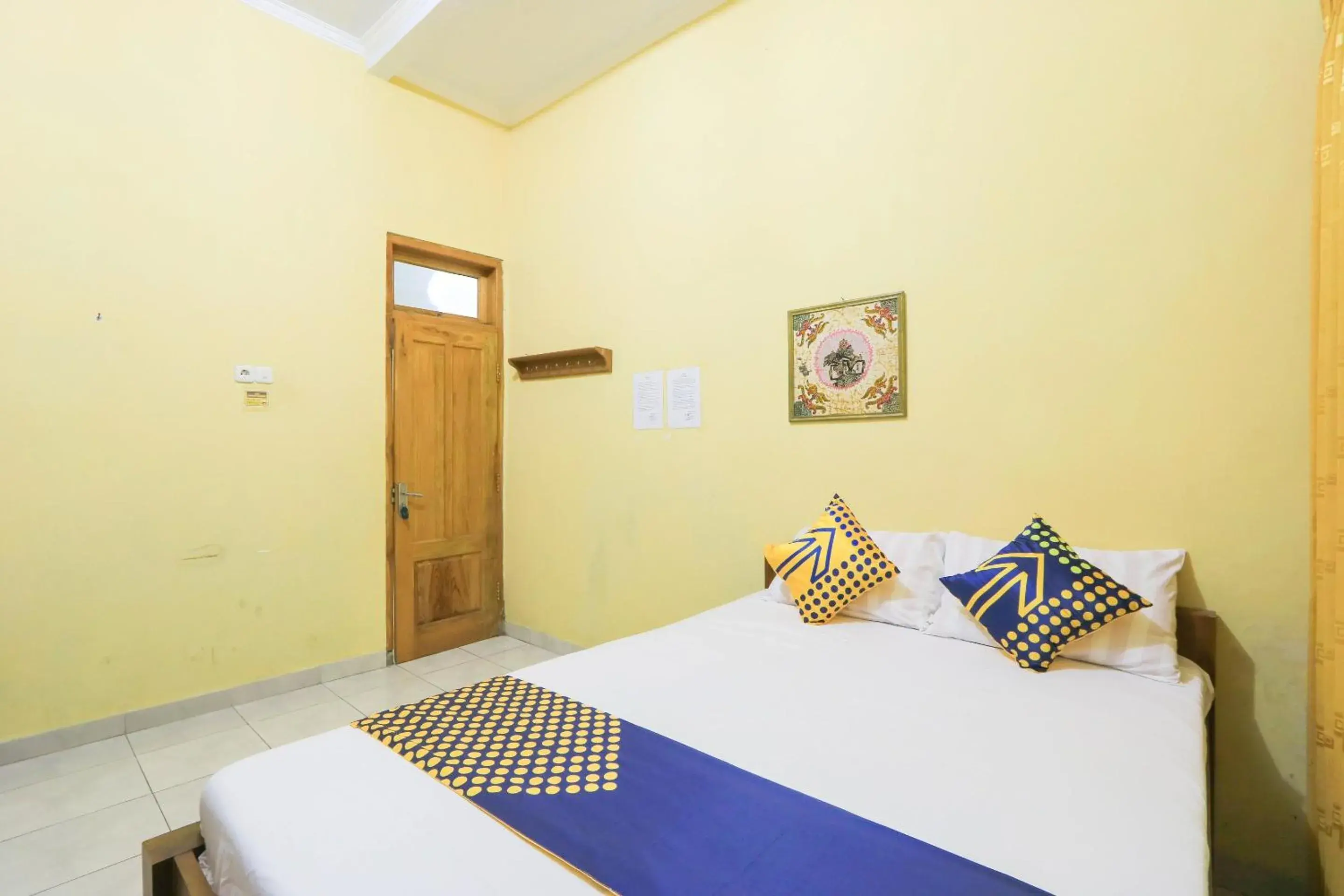 Bedroom in Hotel O Wallet Family Residence Syariah Bedroom in Hotel O Wallet Family Residence Syariah