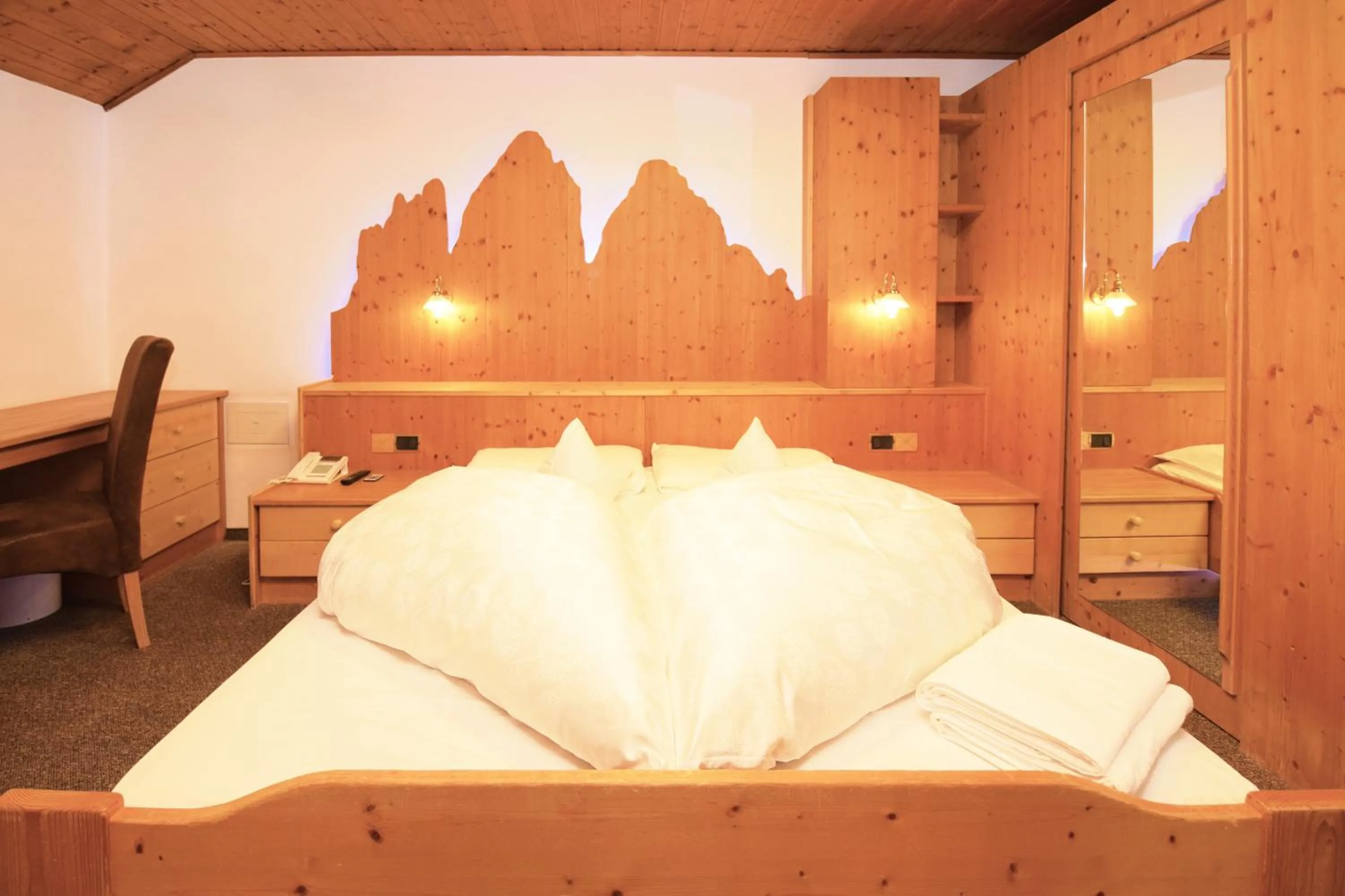 Bed in Hotel Chalet Olympia