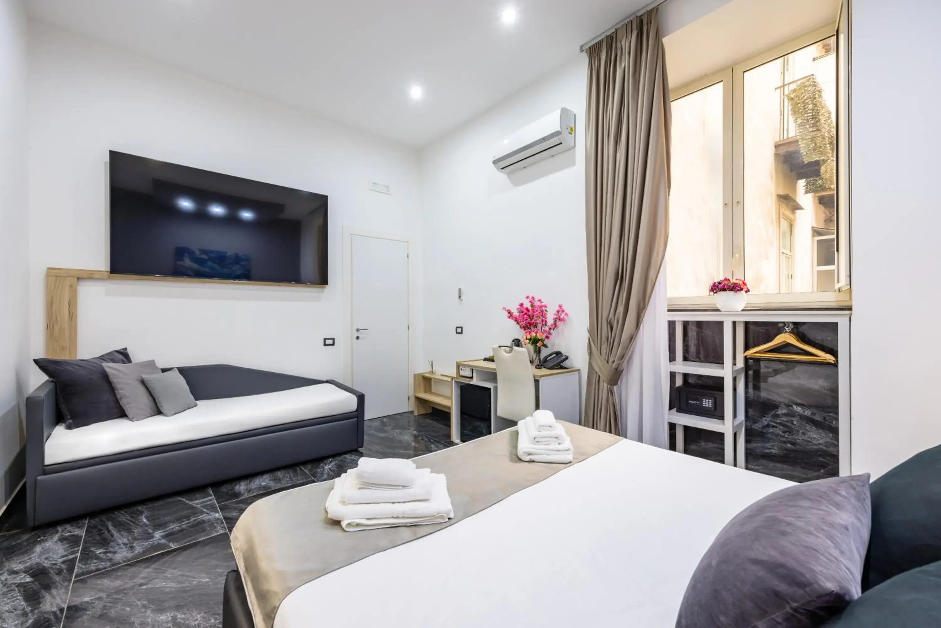 Bed in Bella Napoli Suites Bed in Bella Napoli Suites