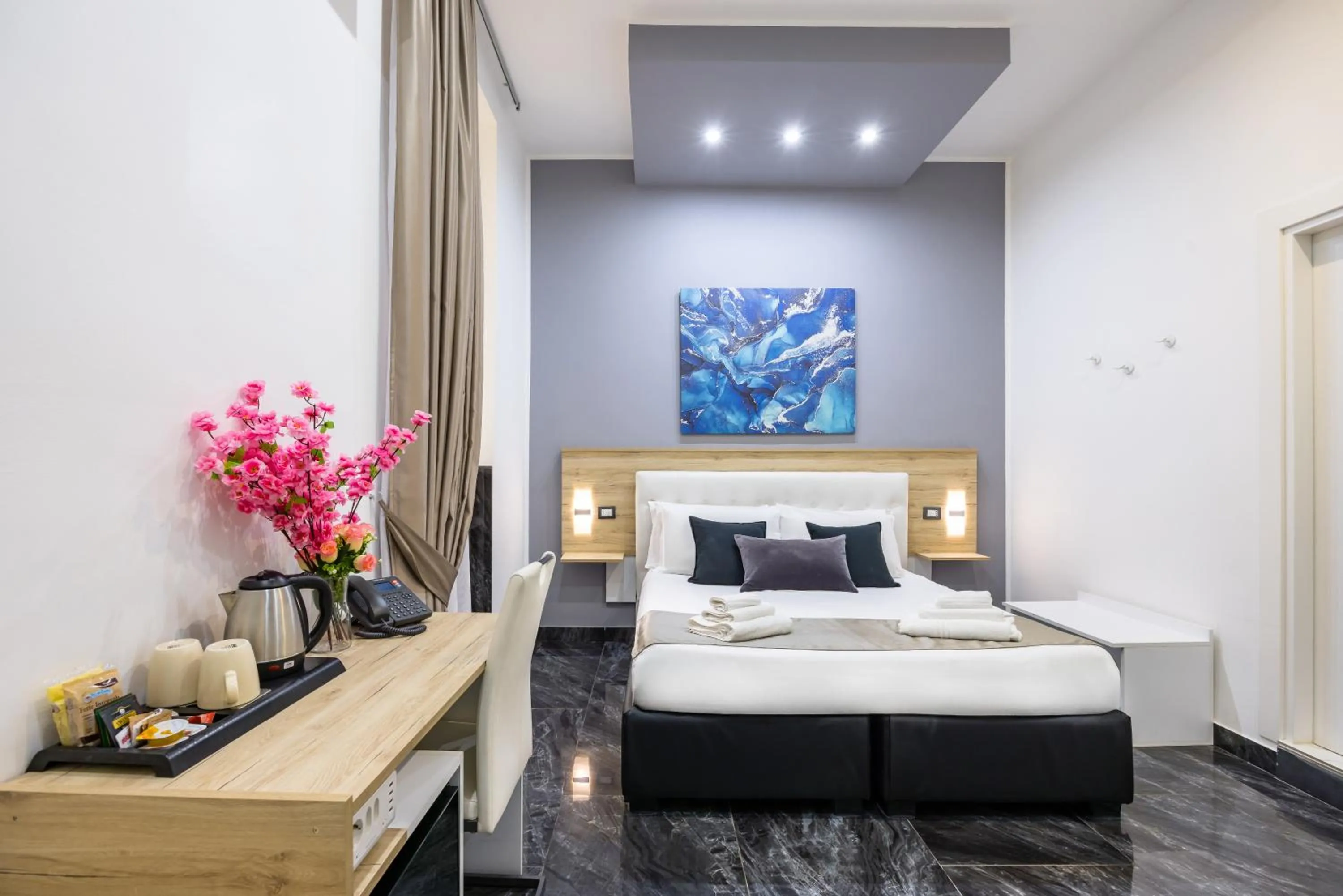 Bed in Bella Napoli Suites