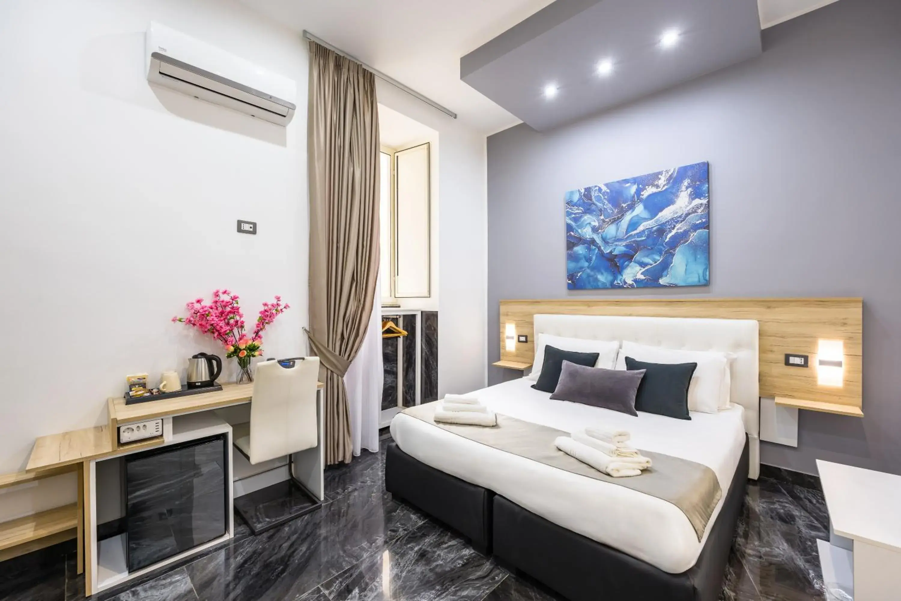 Bed in Bella Napoli Suites Bed in Bella Napoli Suites