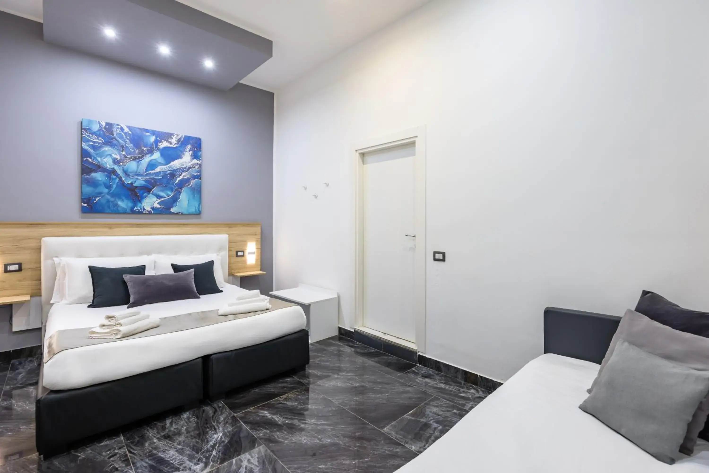 Bed in Bella Napoli Suites Bed in Bella Napoli Suites