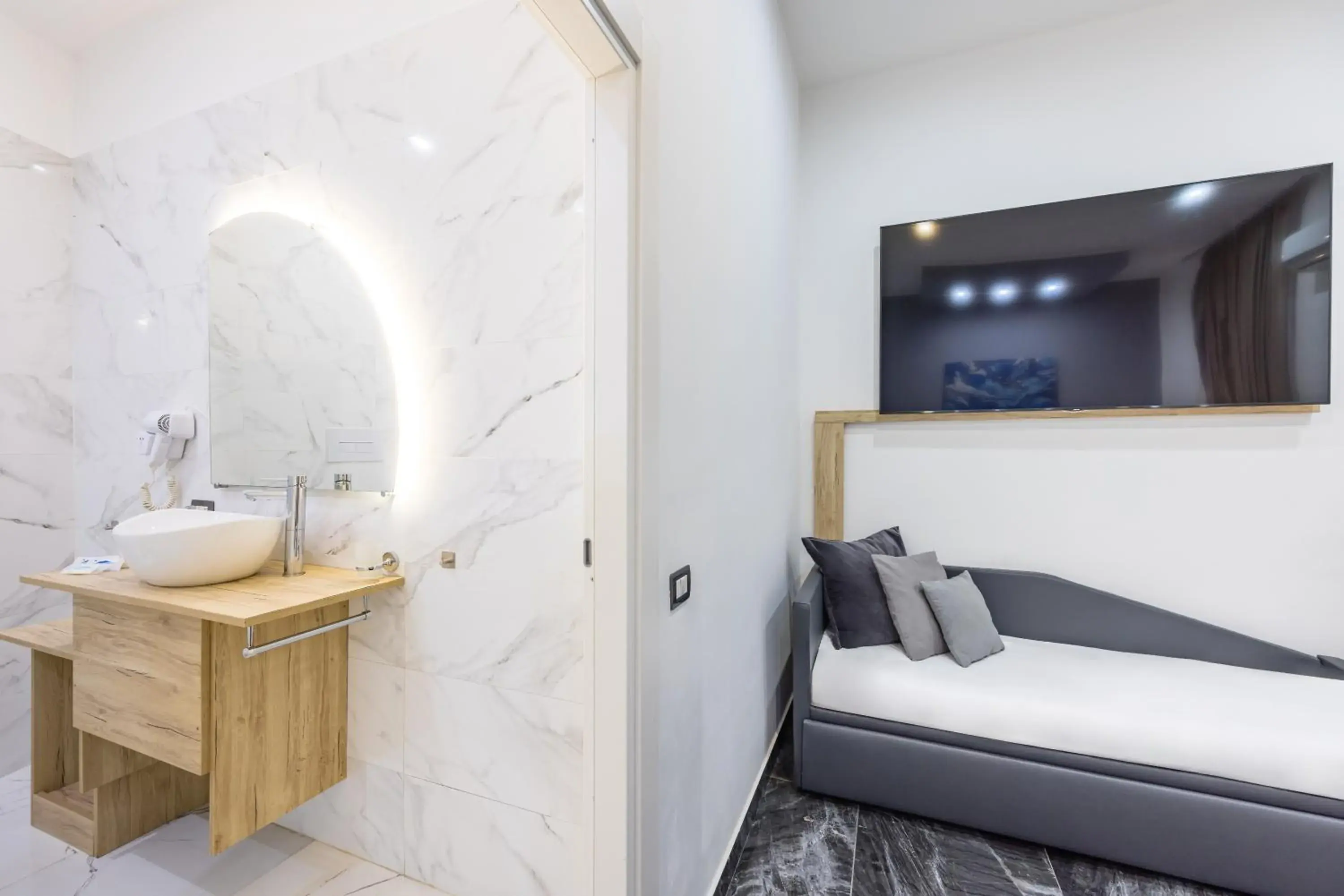 Bed in Bella Napoli Suites Bed in Bella Napoli Suites