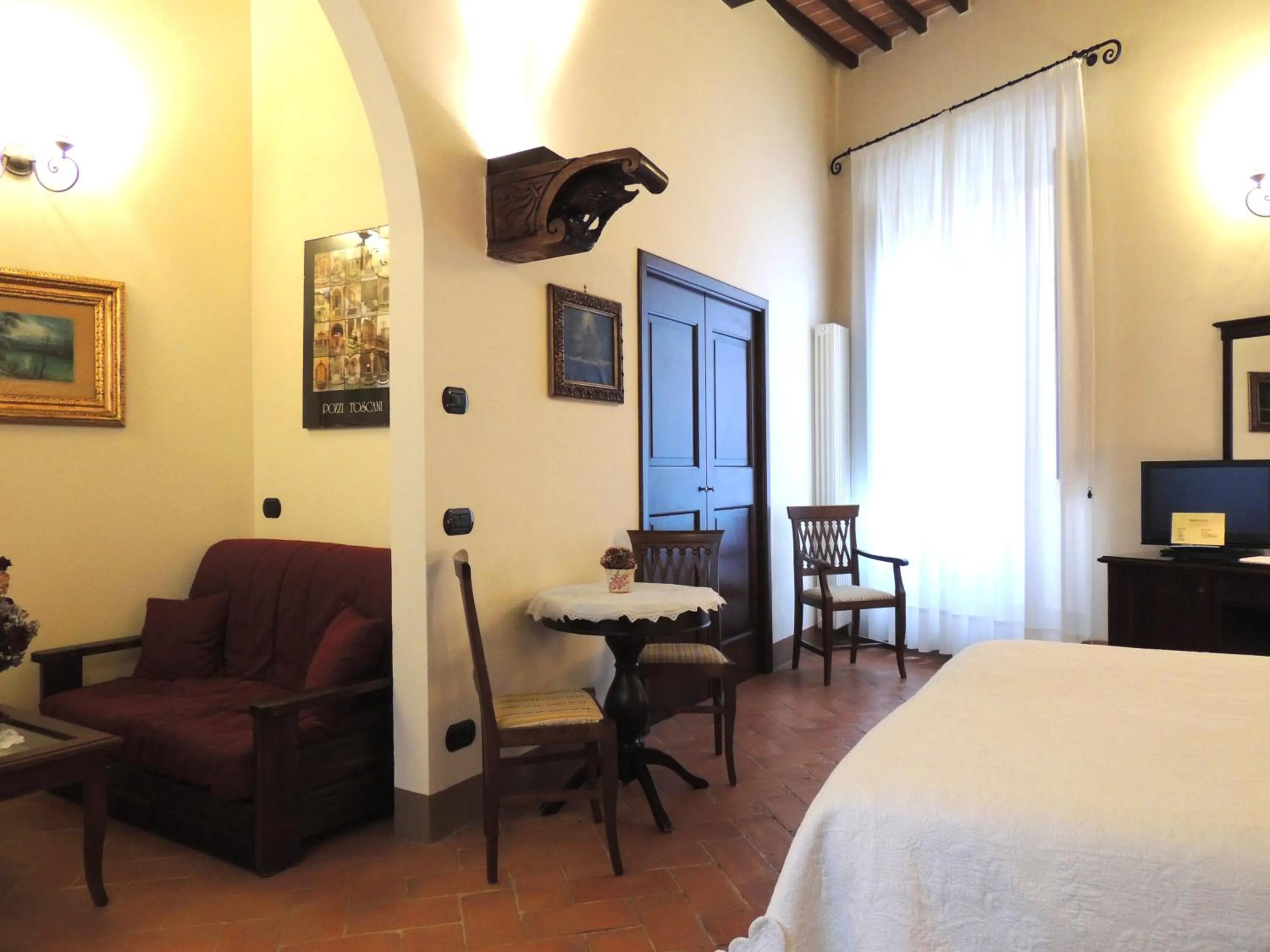 Photo of the whole room, Bed in Meublé il Riccio