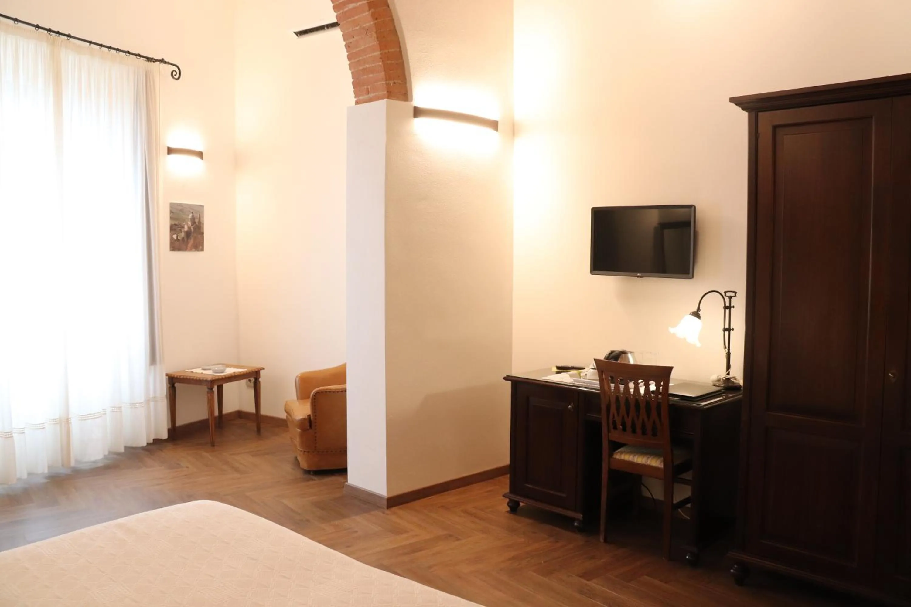 Seating area, Bed in Meublé il Riccio