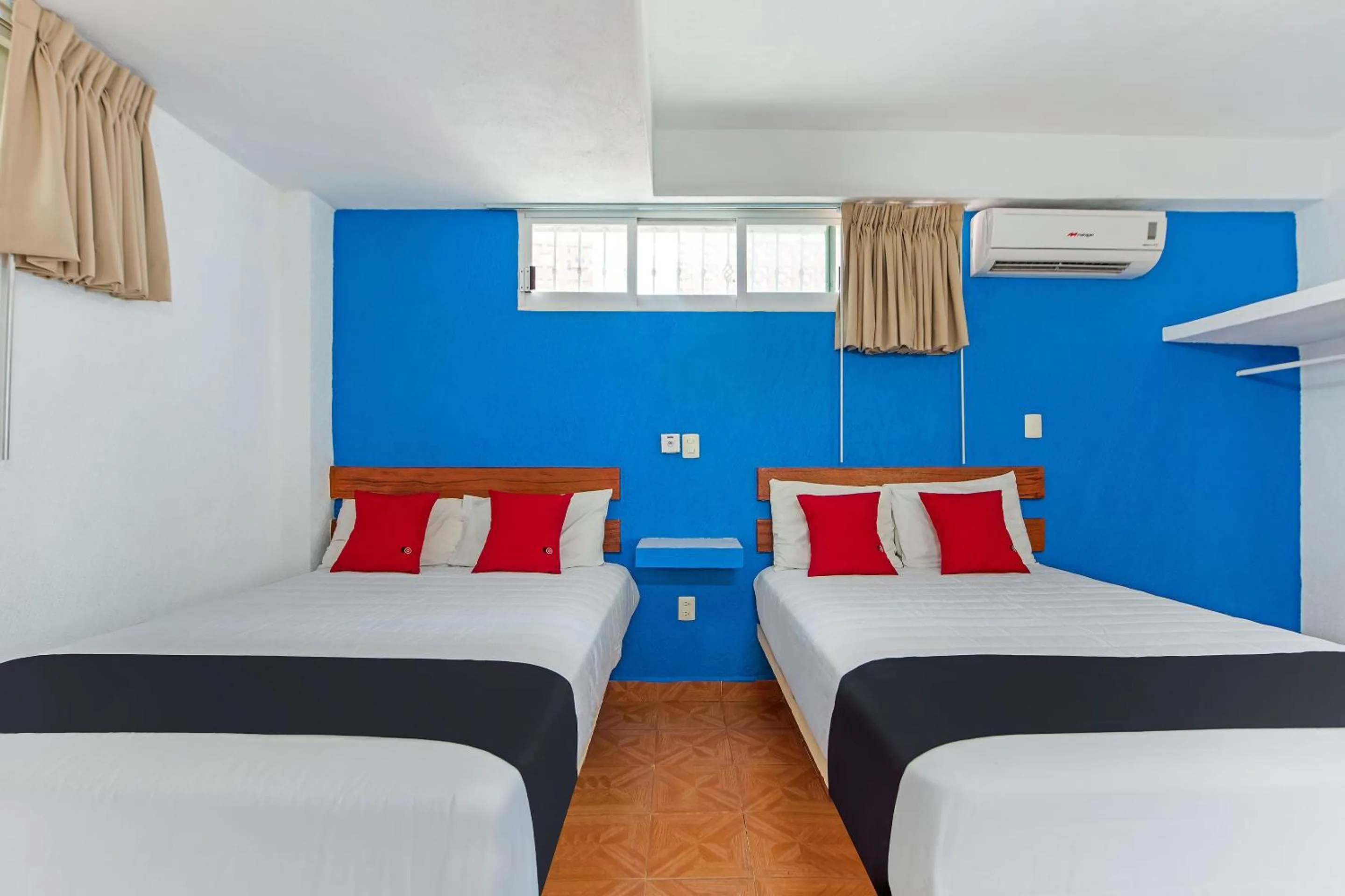 Bedroom, Bed in Capital O Hotel El Mejicano, Acapulco