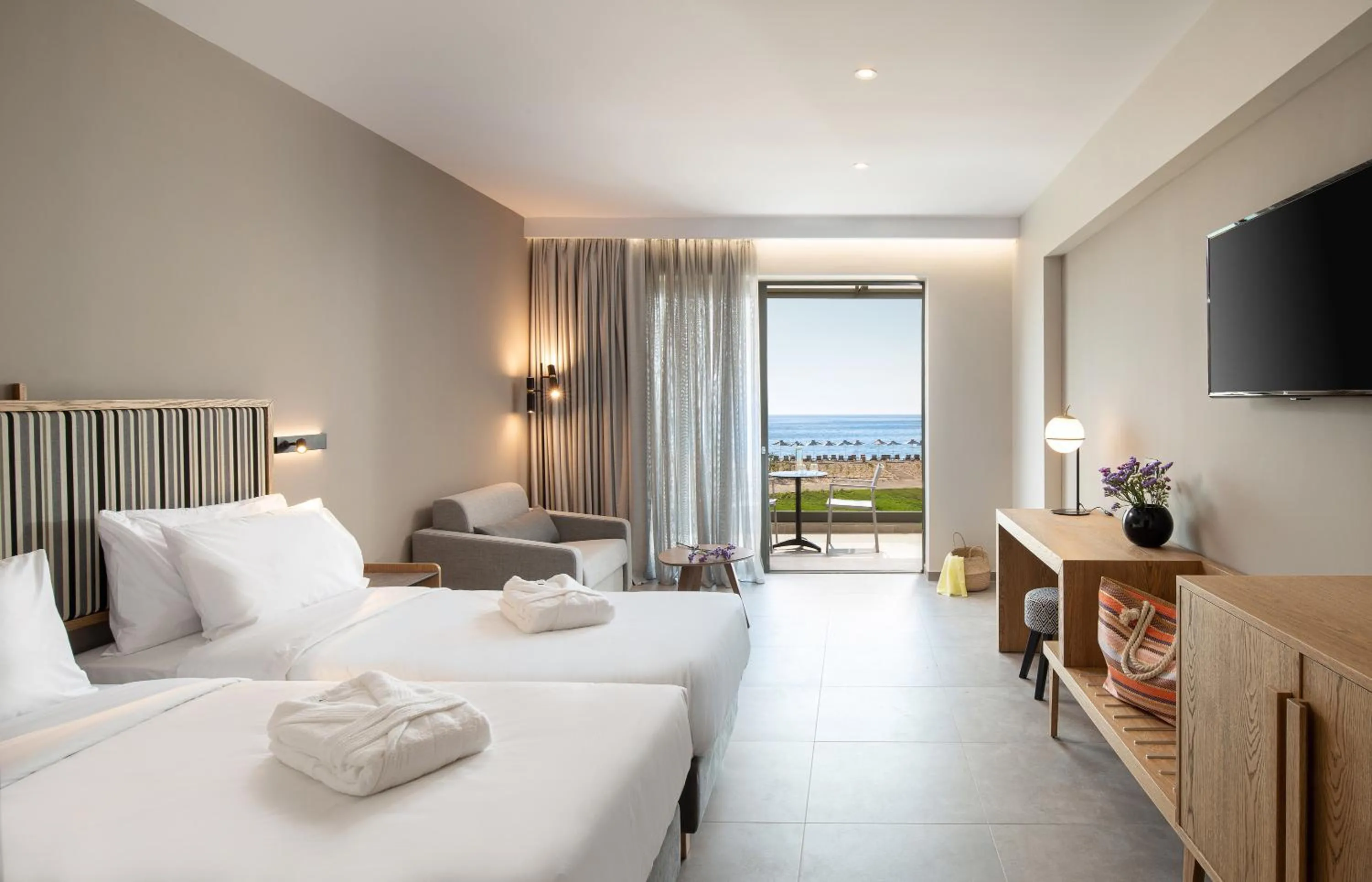 Photo of the whole room, Bed in Portes Lithos Luxury Resort
