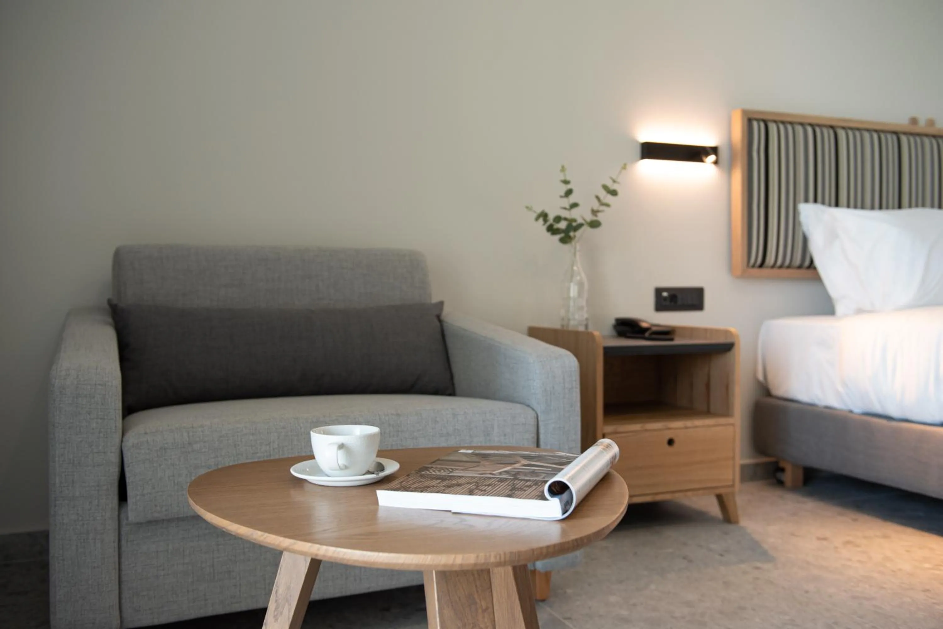 Seating area, Bed in Portes Lithos Luxury Resort
