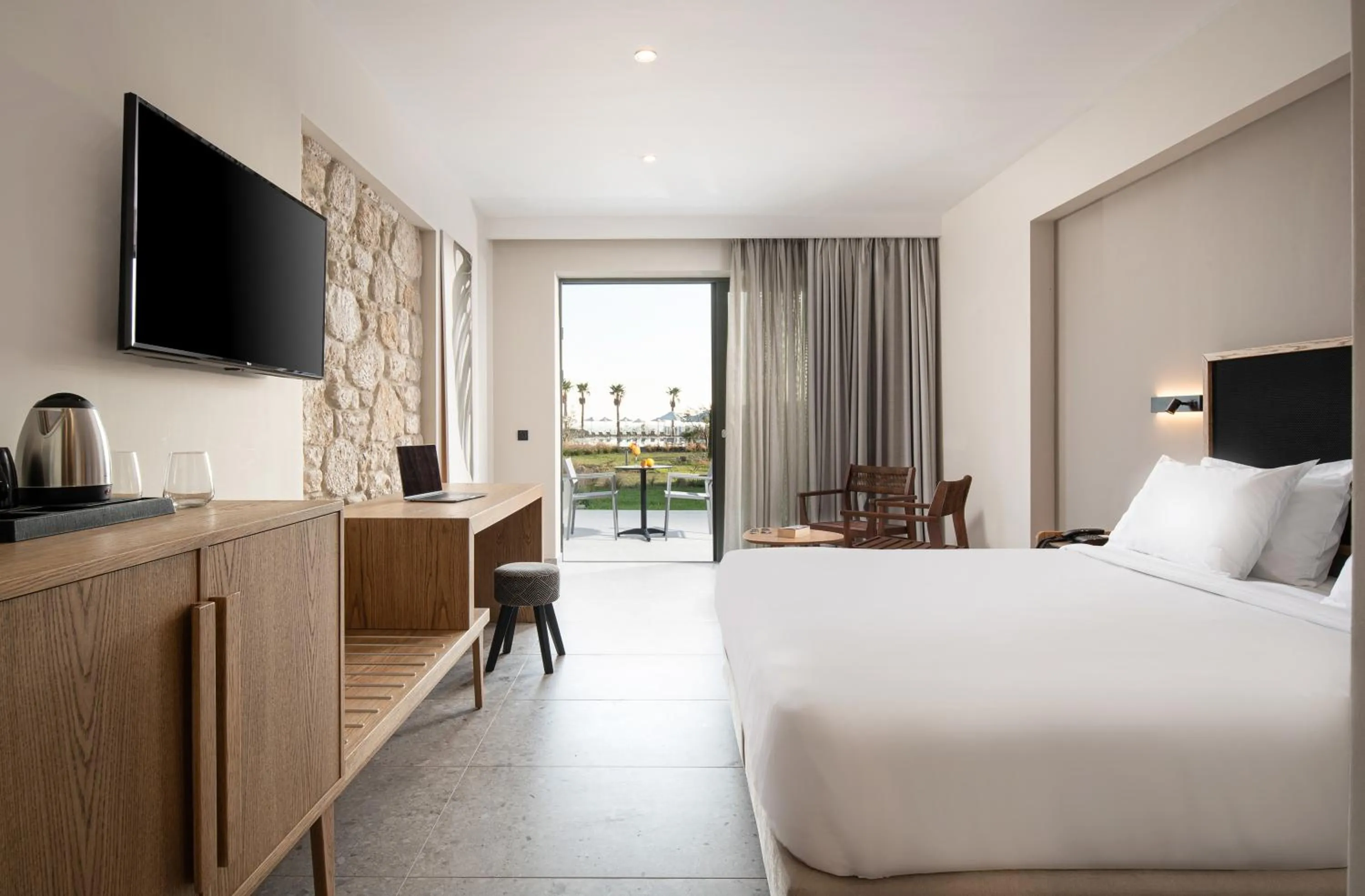 Photo of the whole room, Bed in Portes Lithos Luxury Resort