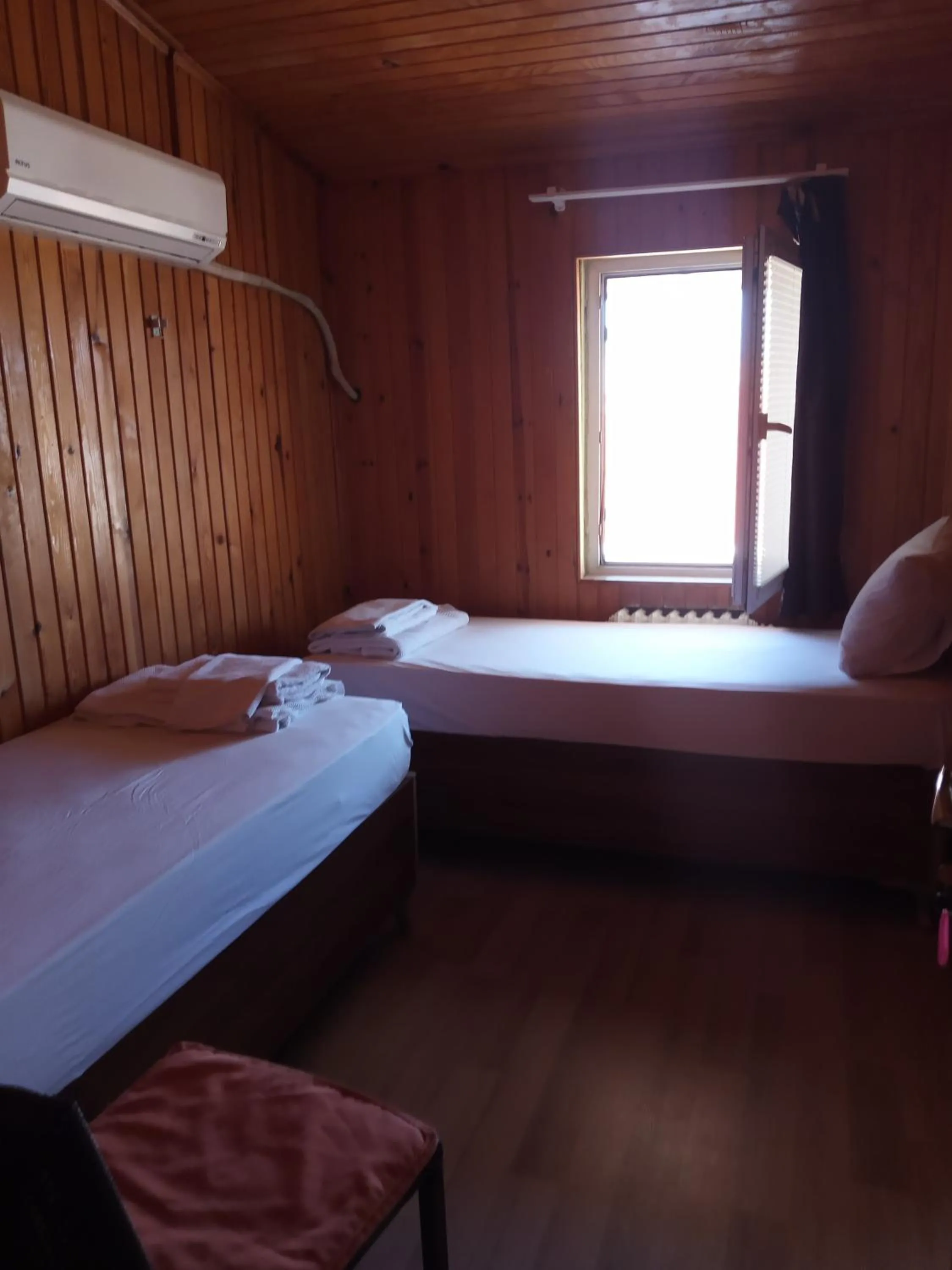 Bed in GÜVEN HOTEL