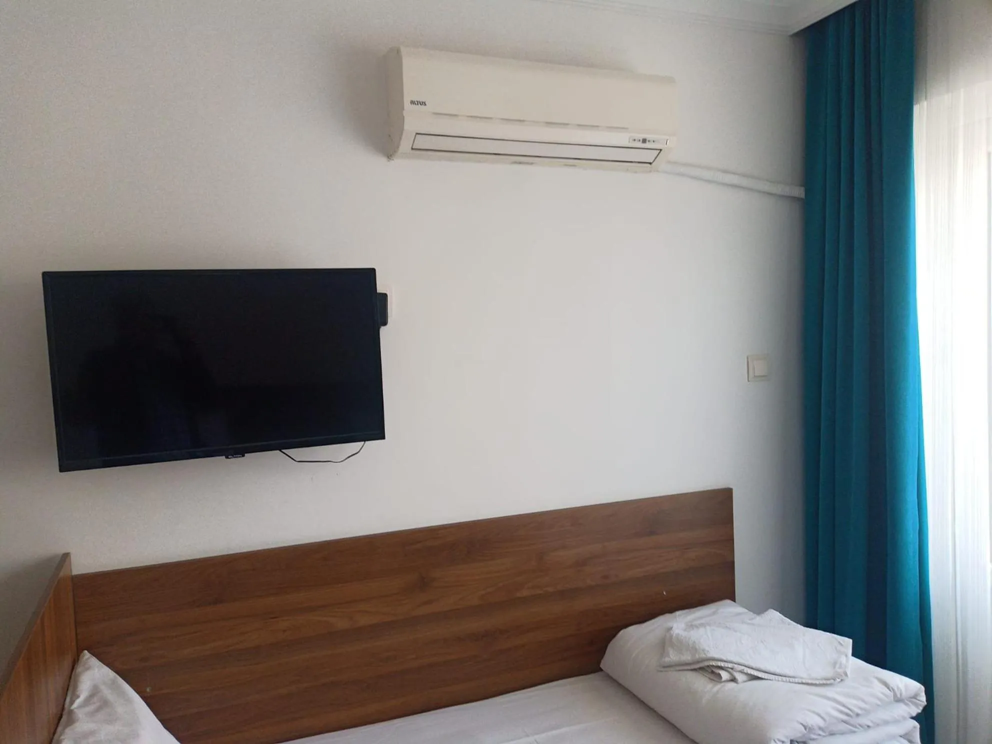 Bed in GÜVEN HOTEL