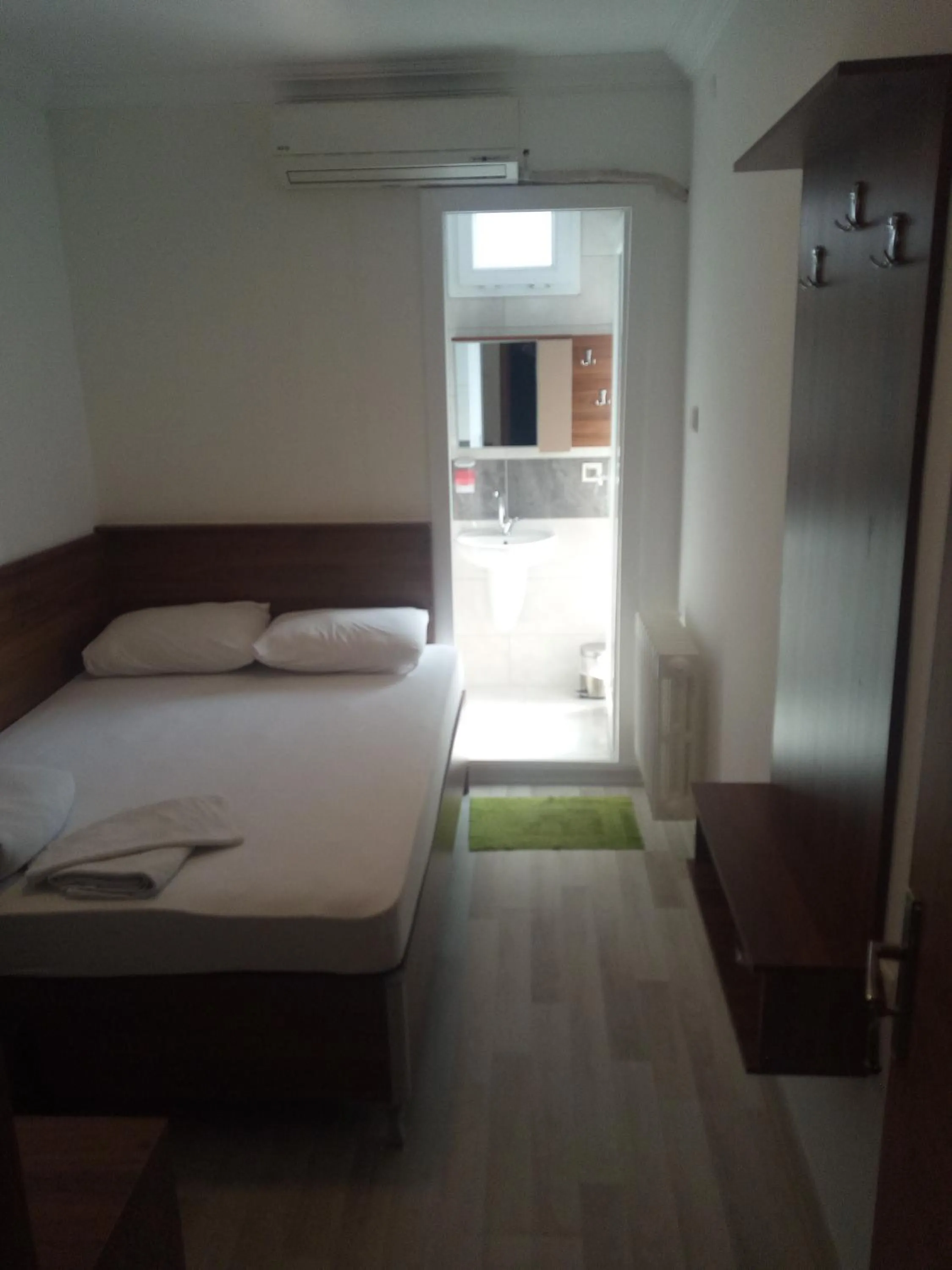 Bed in GÜVEN HOTEL