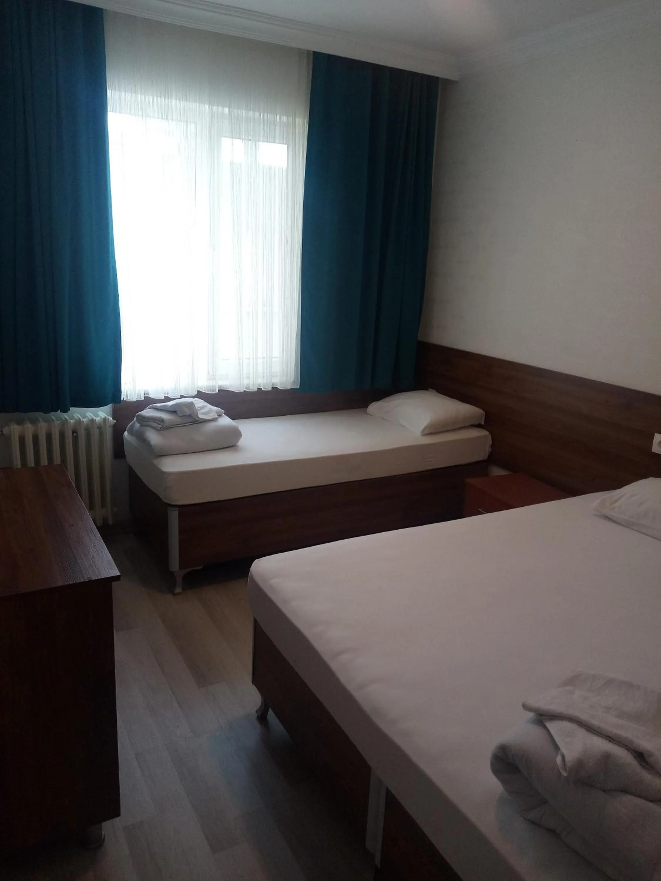 Bed in GÜVEN HOTEL