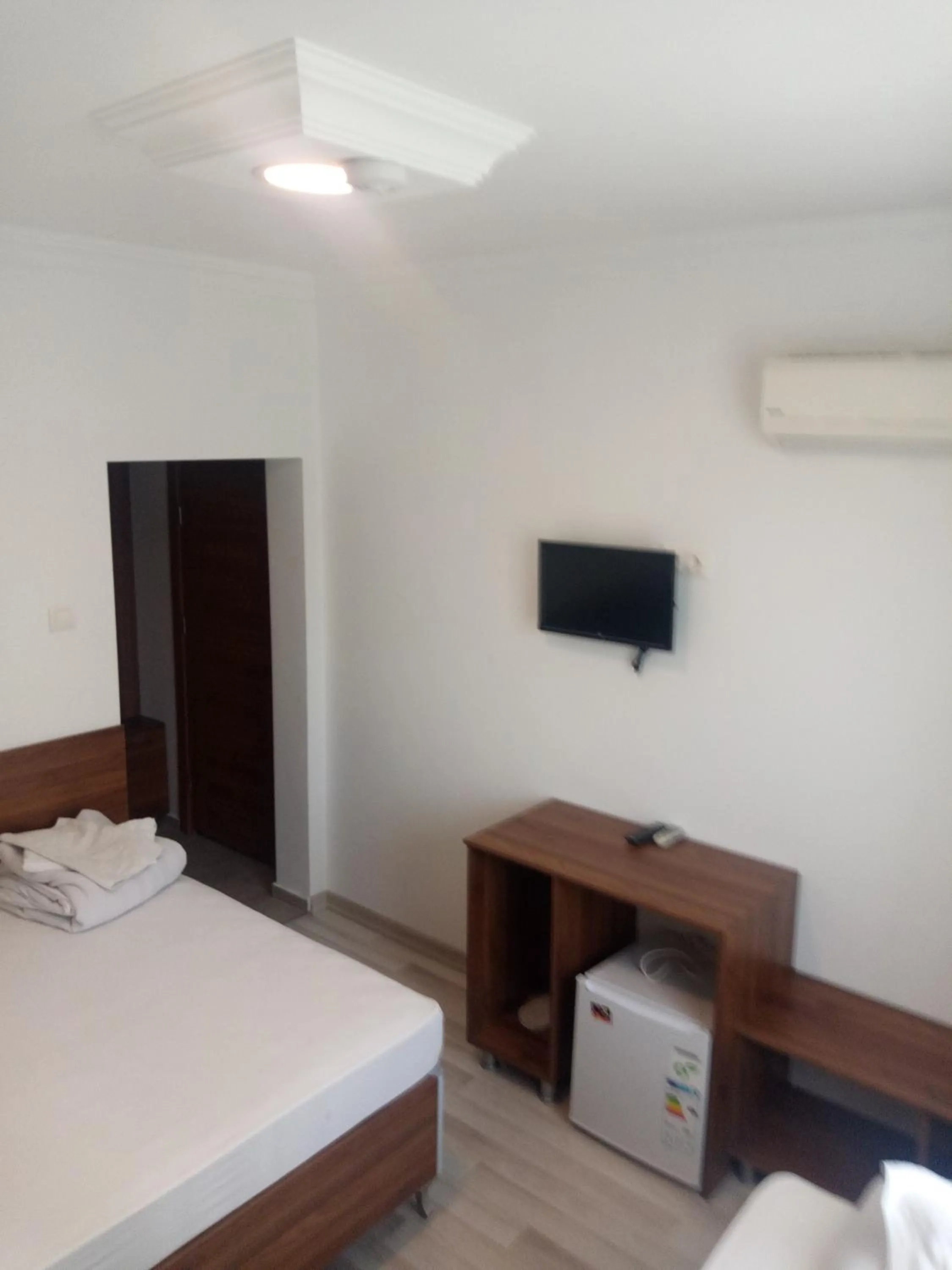 Bed in GÜVEN HOTEL