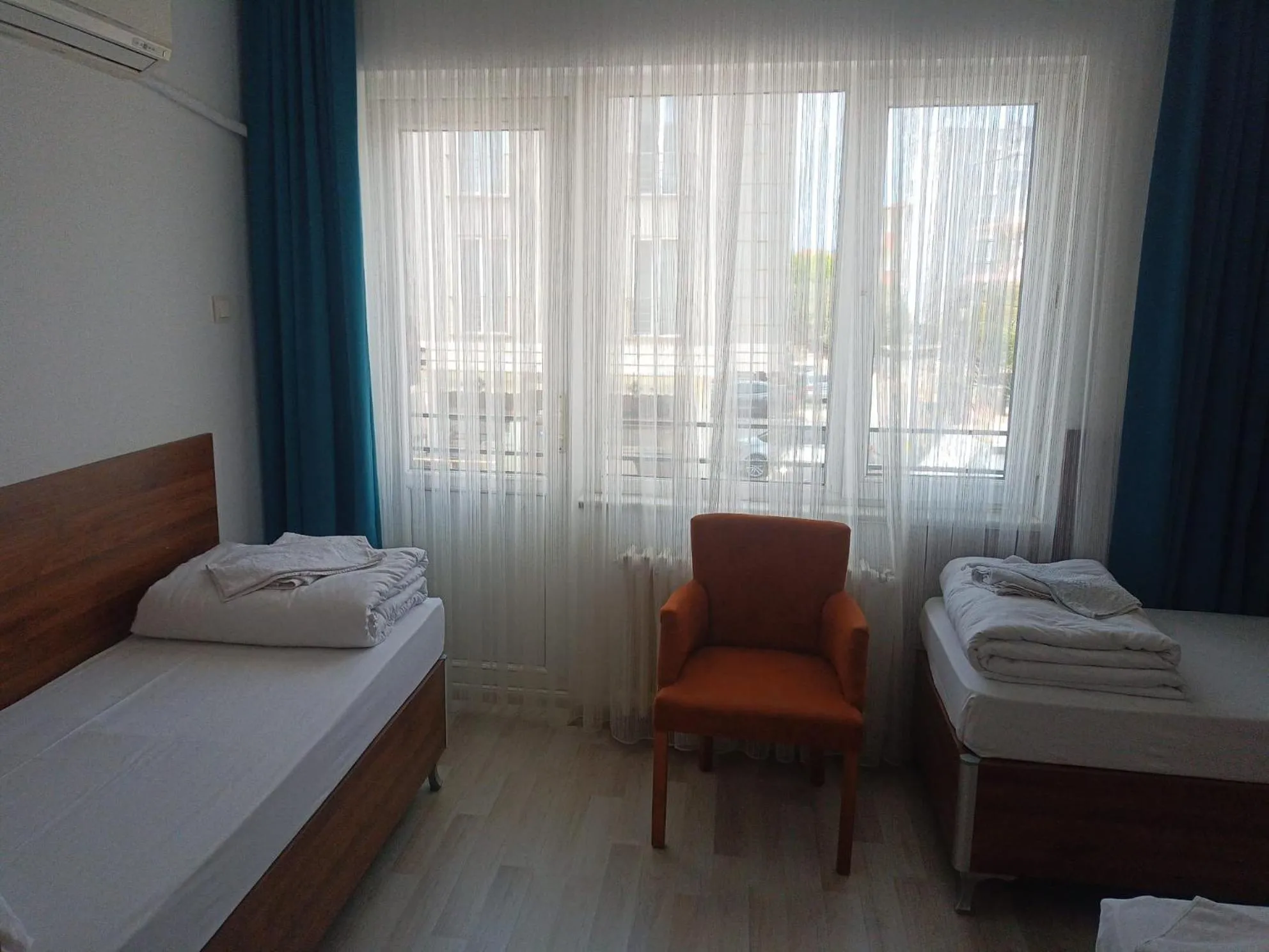 Bed in GÜVEN HOTEL