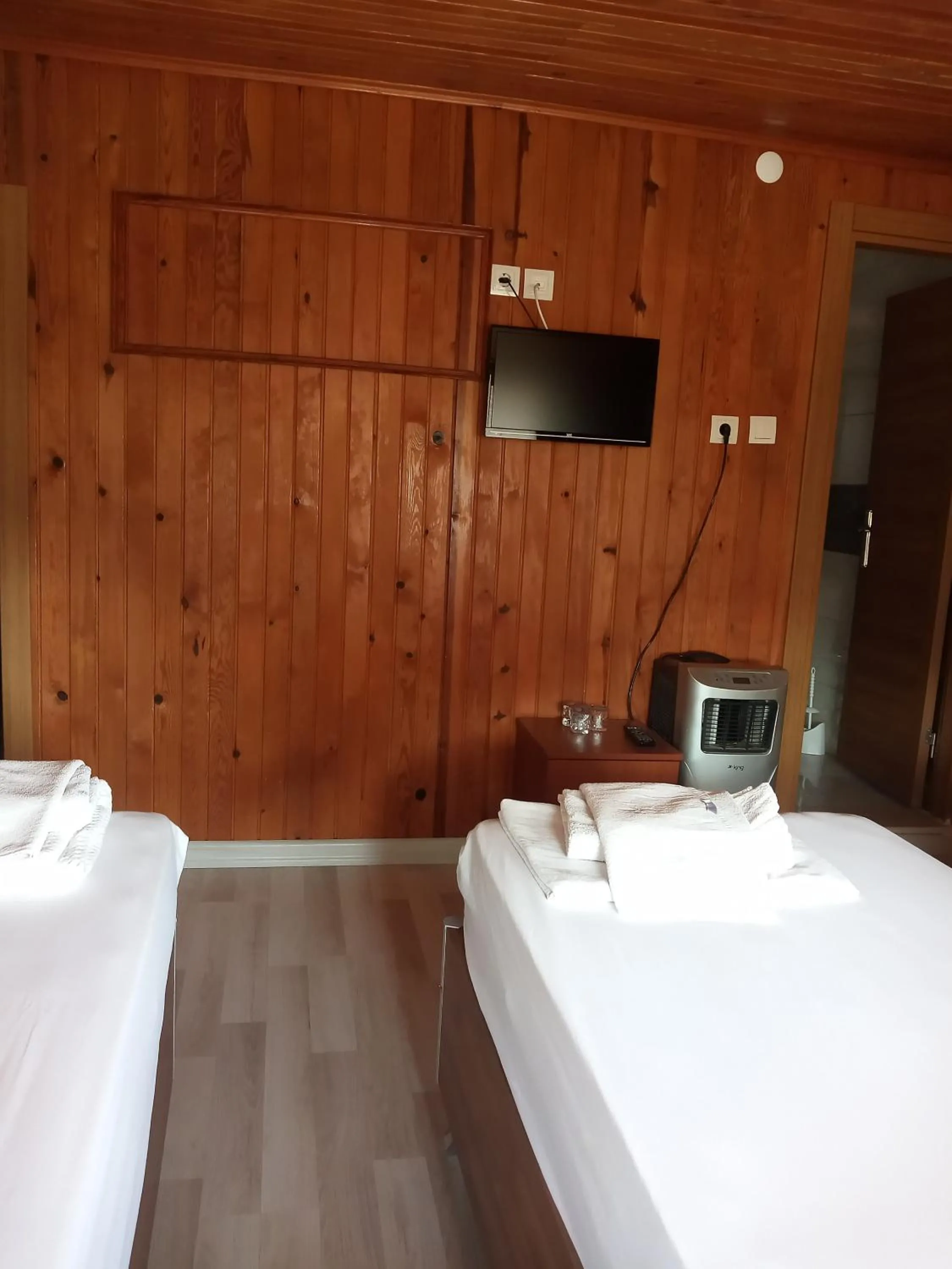 Bed in GÜVEN HOTEL