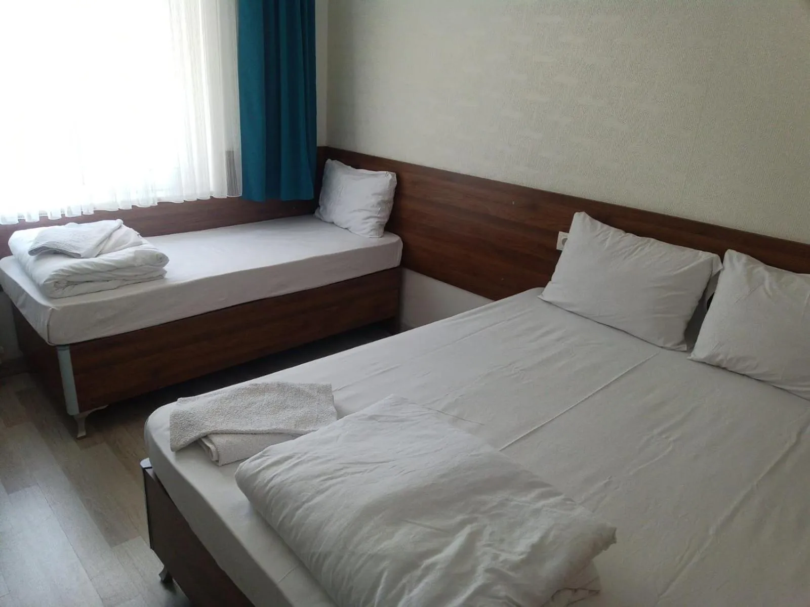 Bed in GÜVEN HOTEL