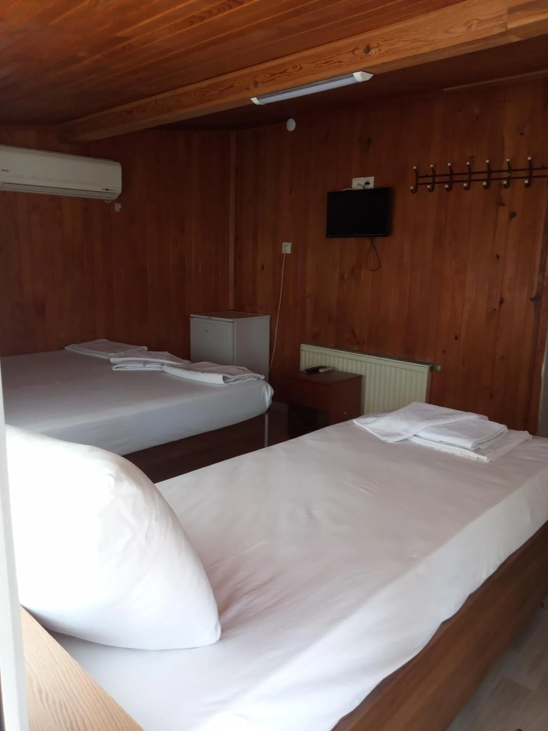 Bed in GÜVEN HOTEL