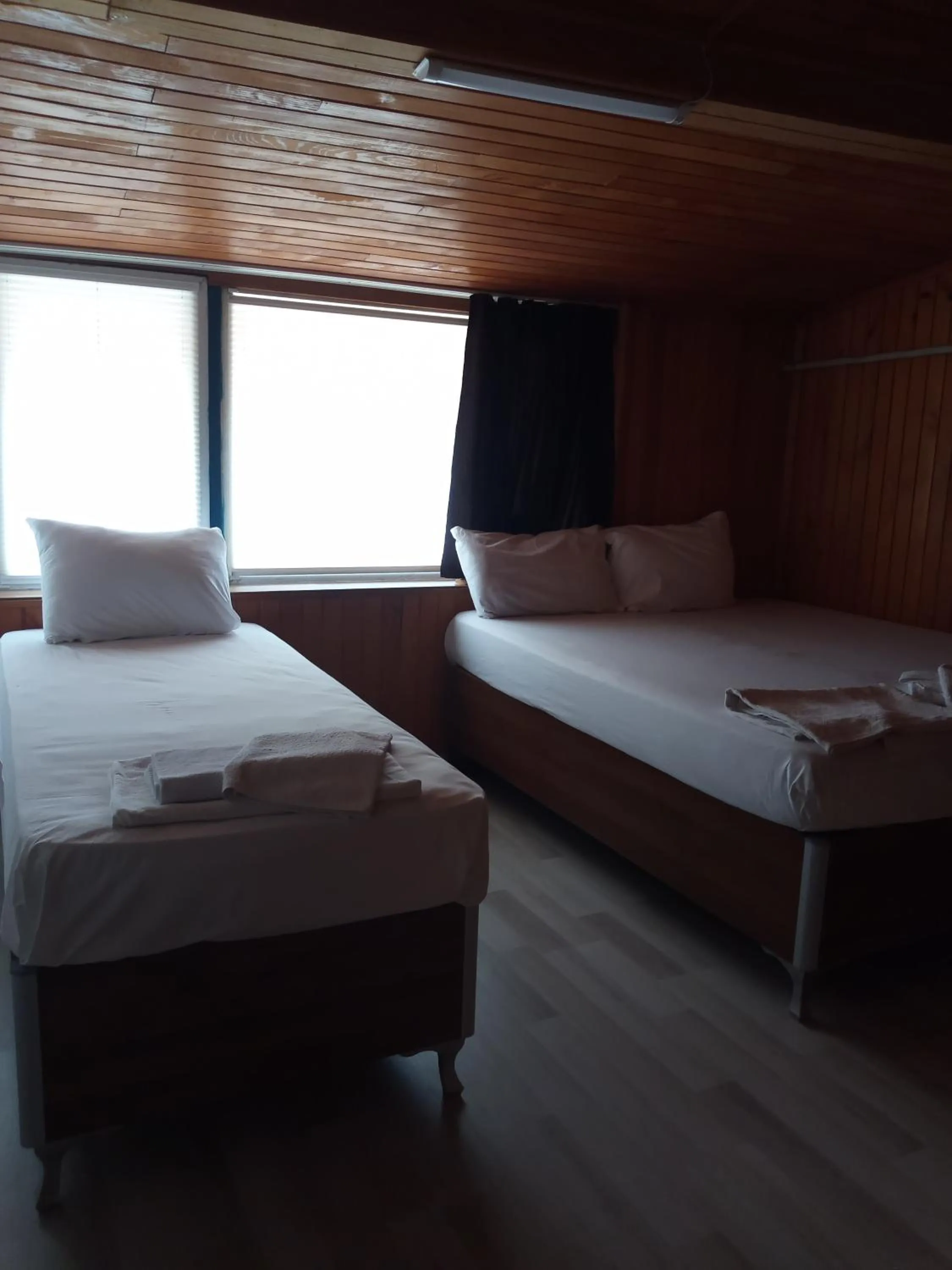 Bed in GÜVEN HOTEL