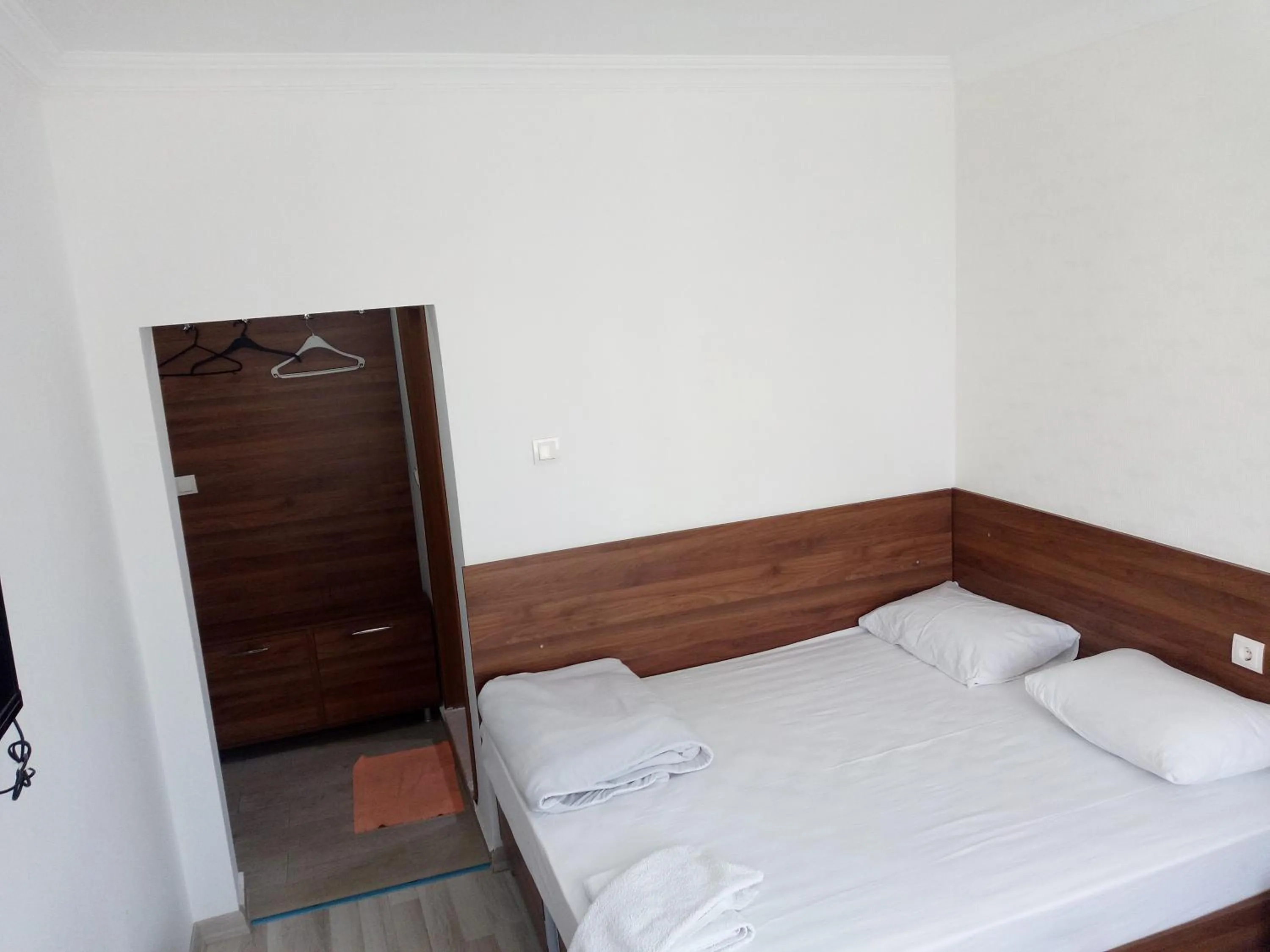Bed in GÜVEN HOTEL