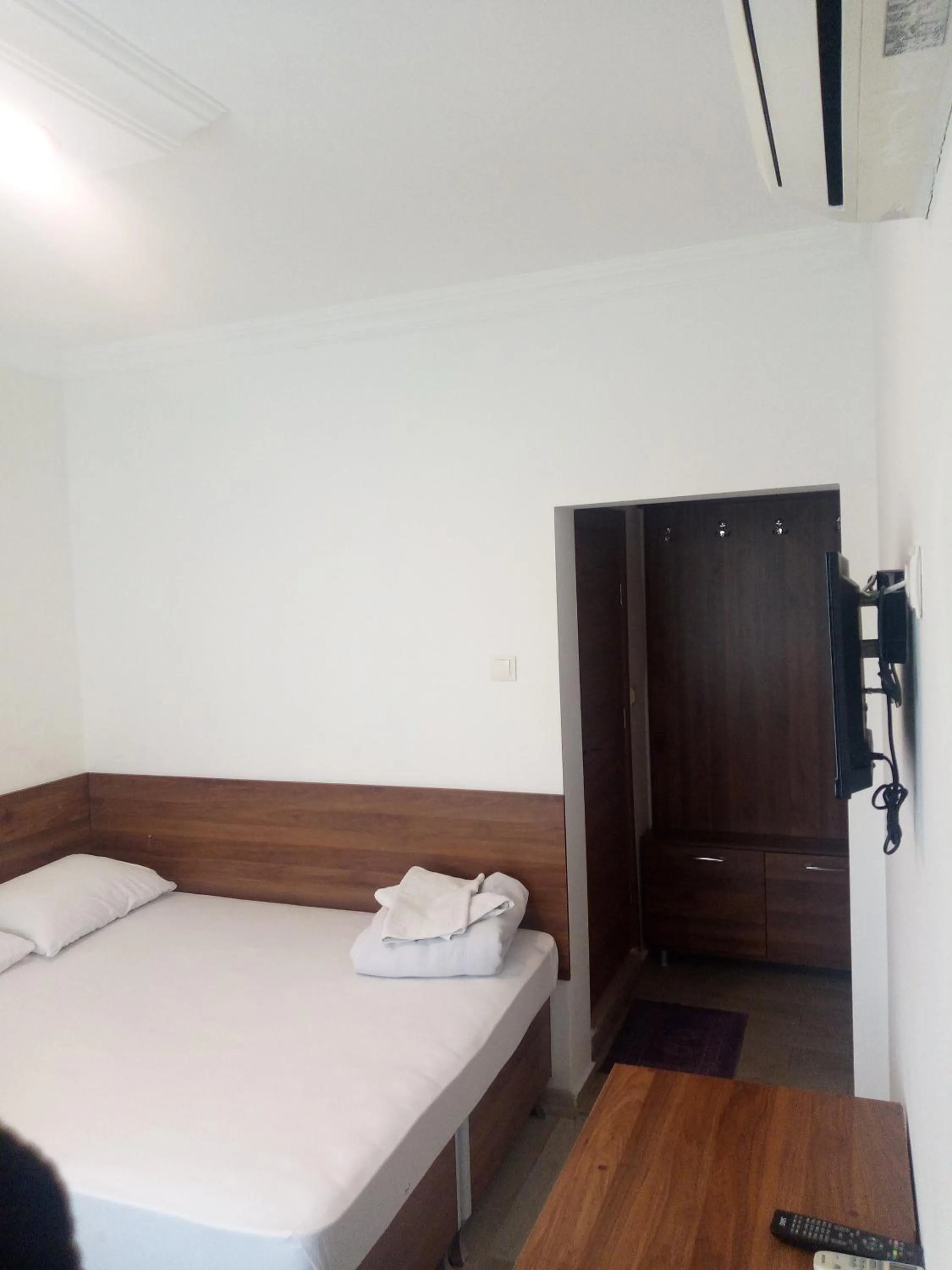 Bed in GÜVEN HOTEL