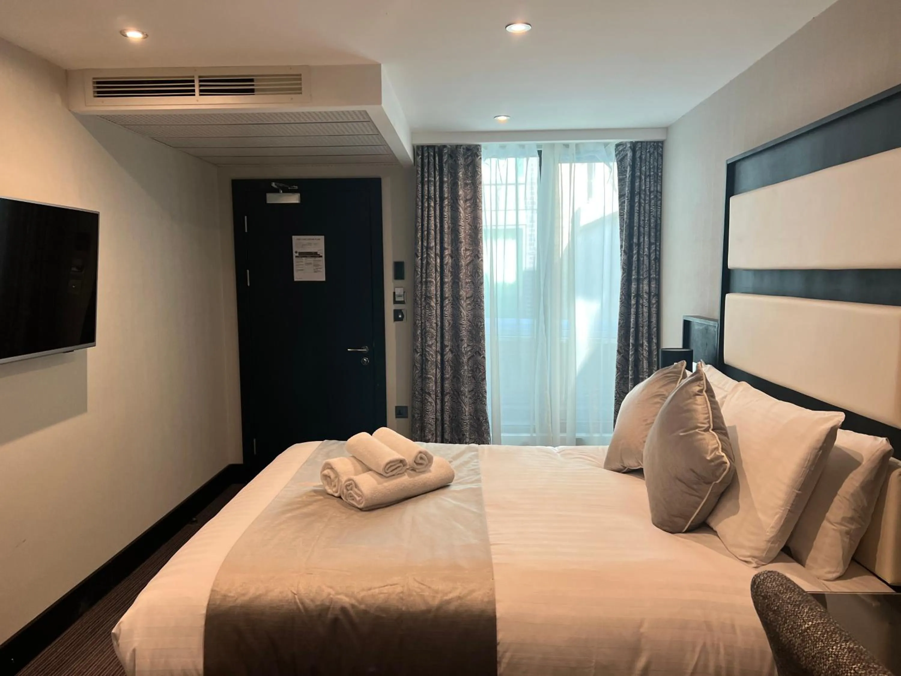 Bed in Hatton Garden Hotel