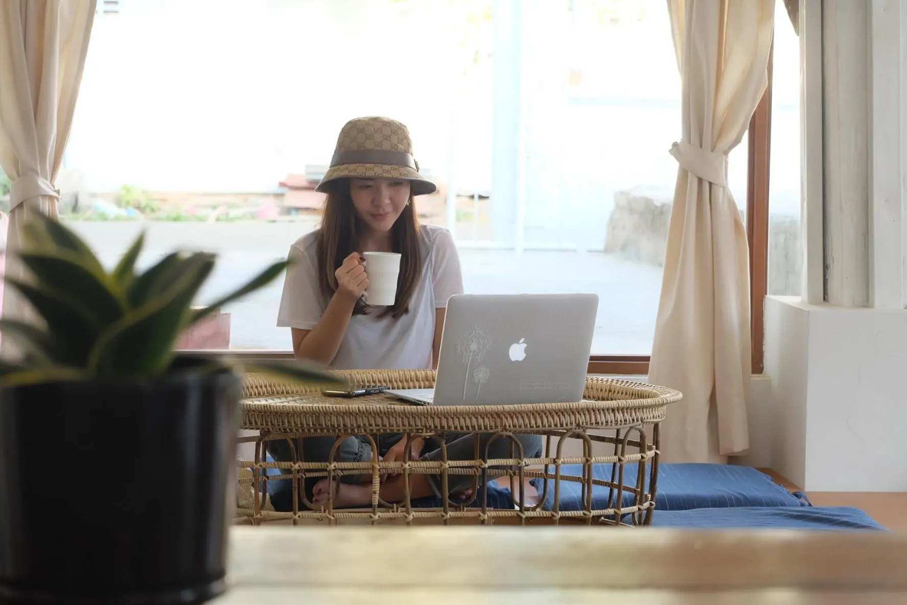 Communal lounge/ TV room in Barn Laos Hostel