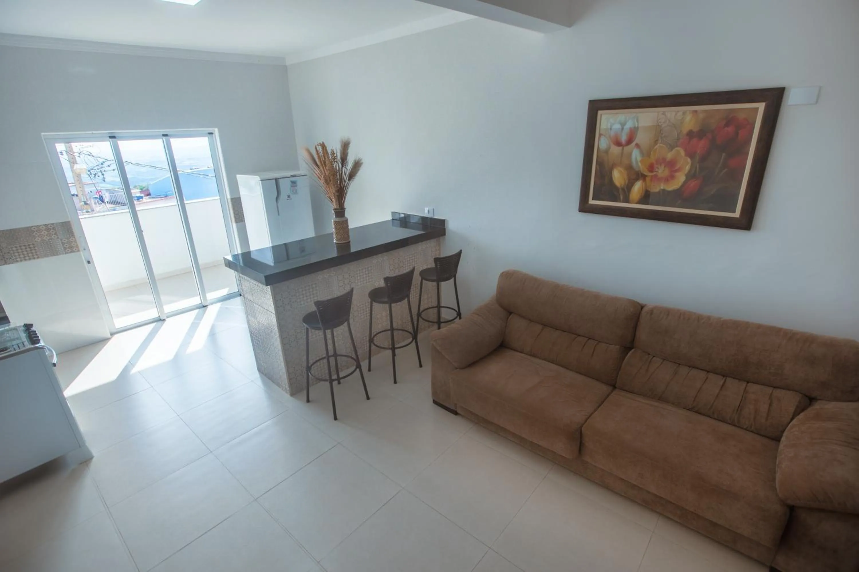 Living room in Souza Reis Apart - Unidade 1