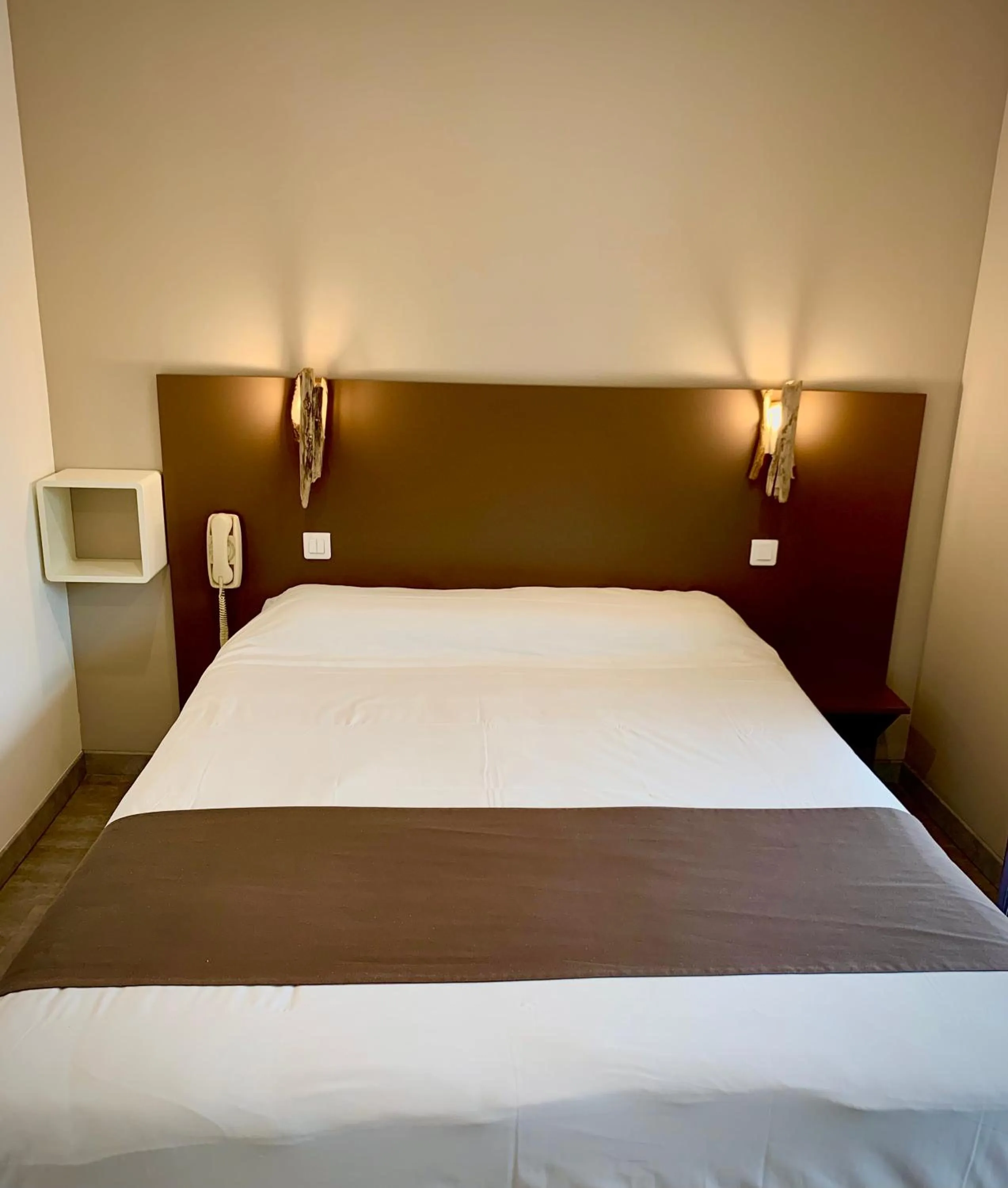 Bed in Hôtel Beau Soleil