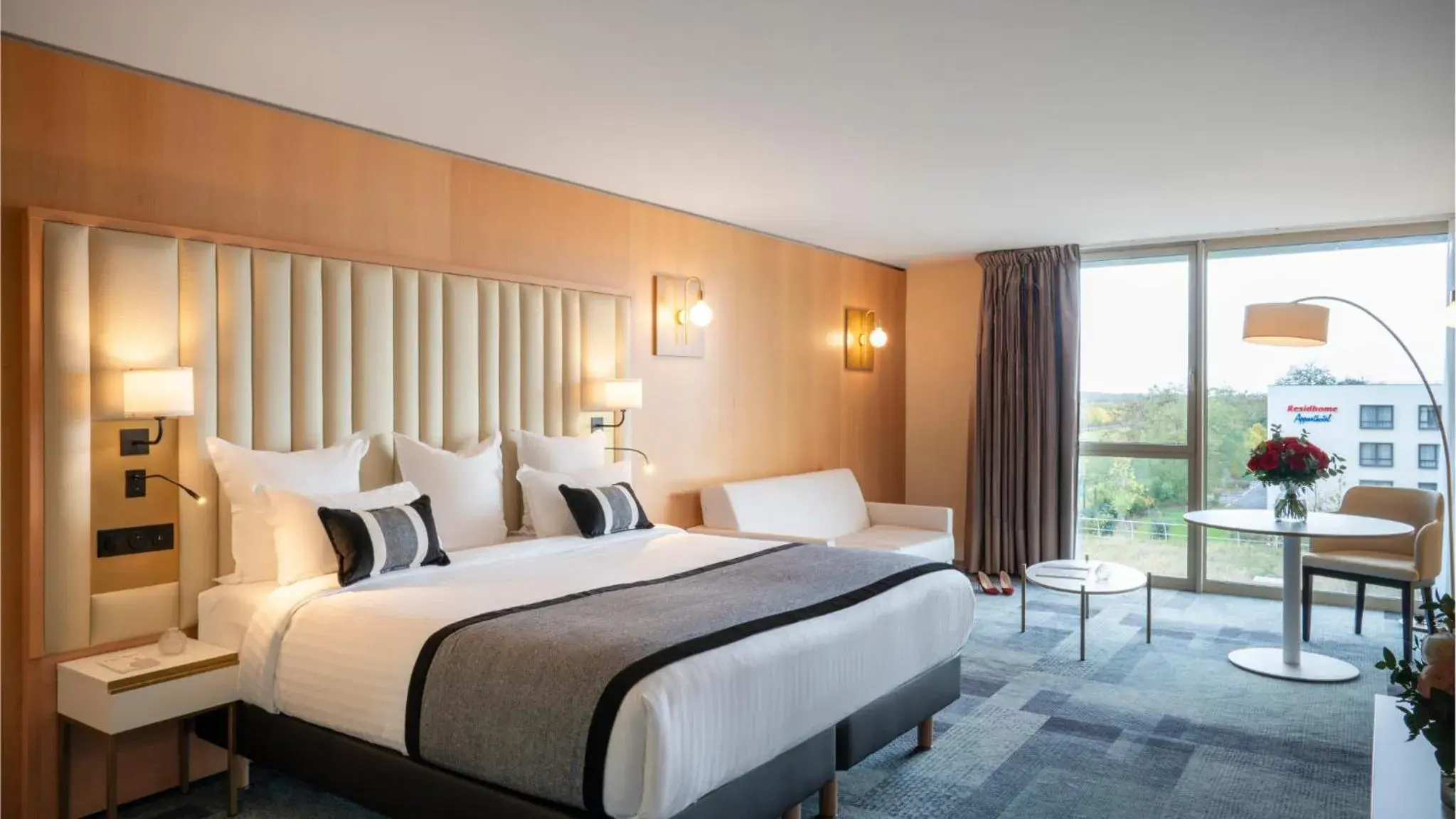 Property building, Bed in Residhome Suites Paris Sénart Property building, Bed in Residhome Suites Paris Sénart