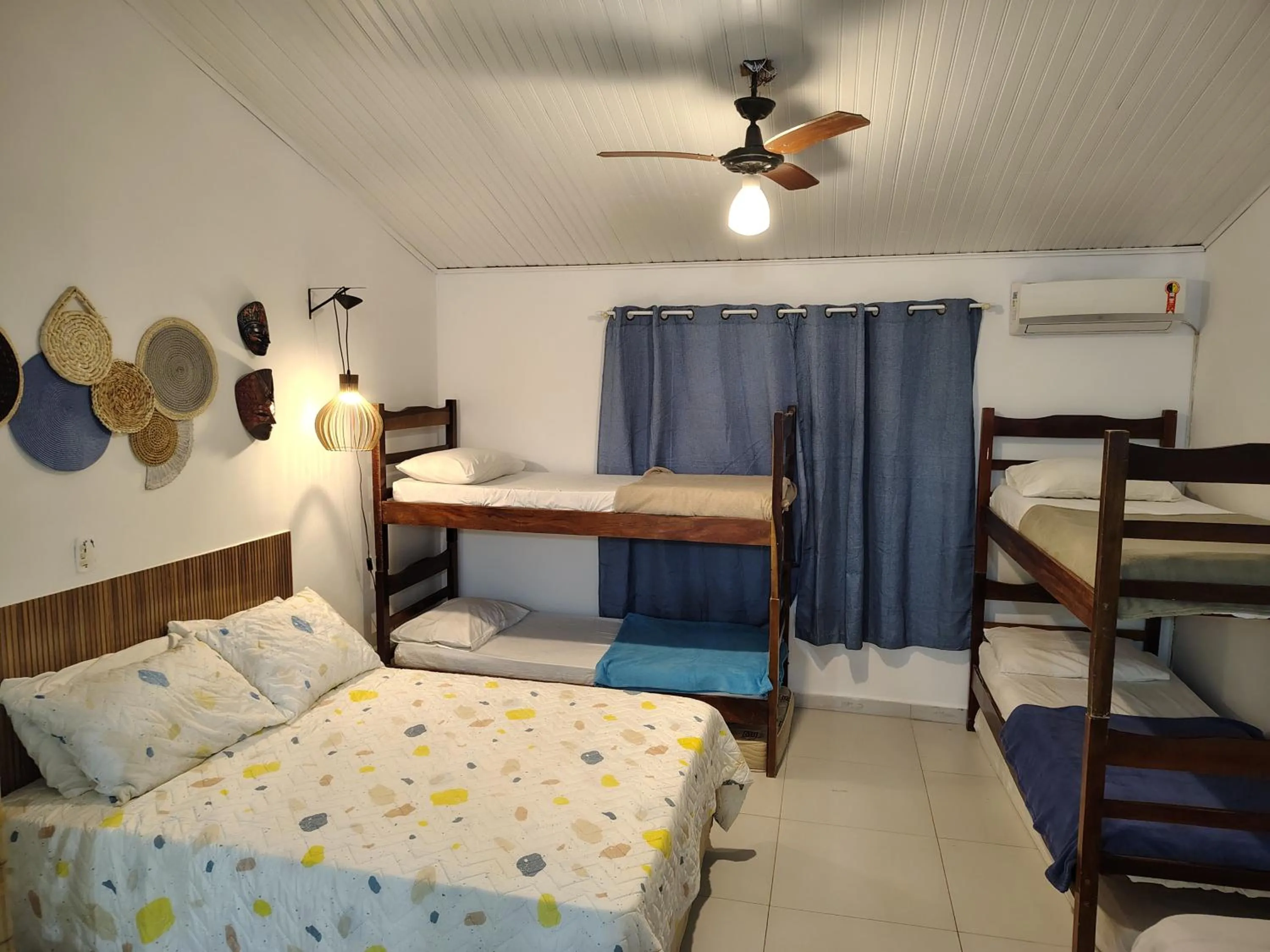 Bed in Villa Bali Maresias Lofts