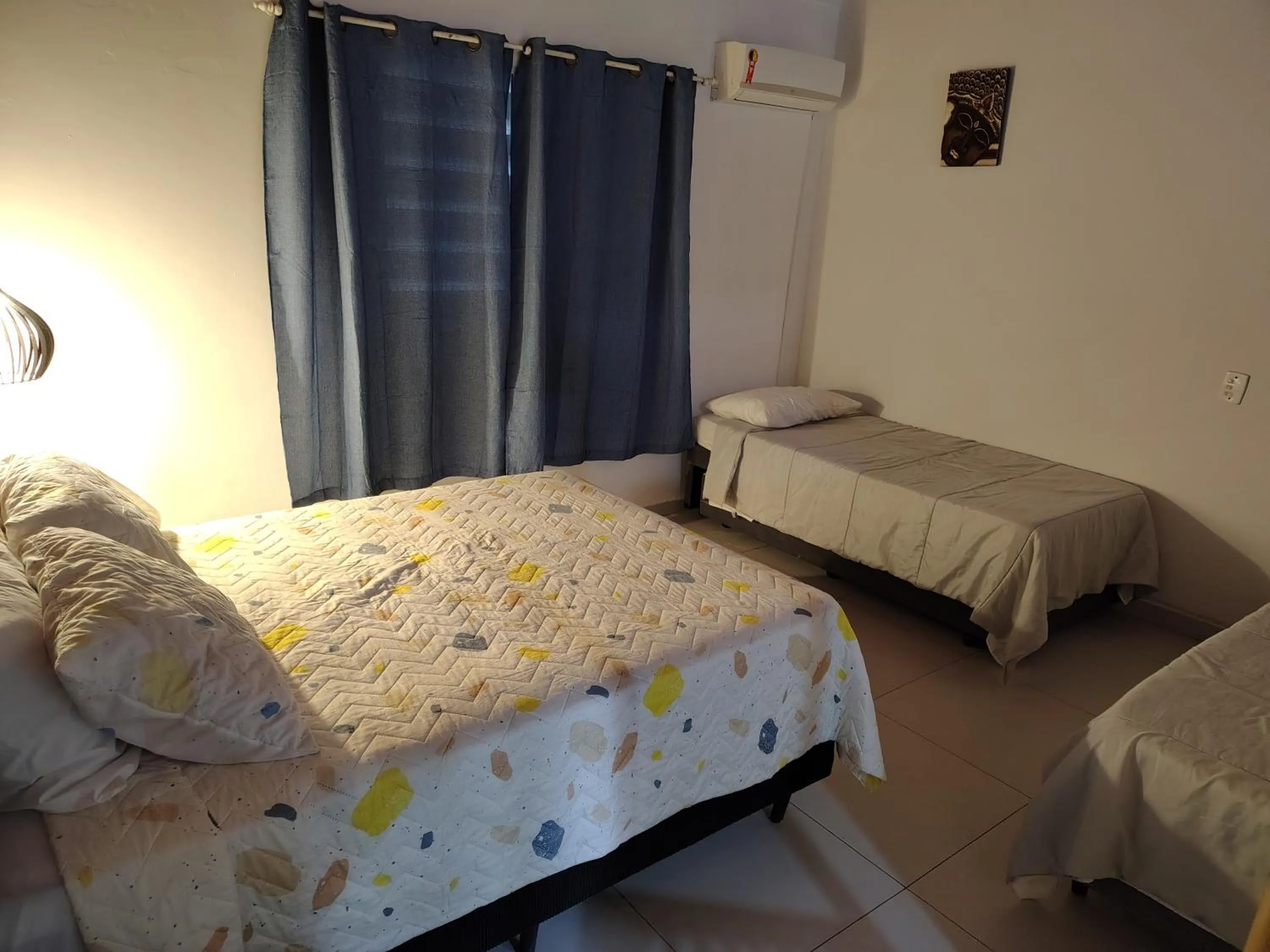 Bed in Villa Bali Maresias Lofts