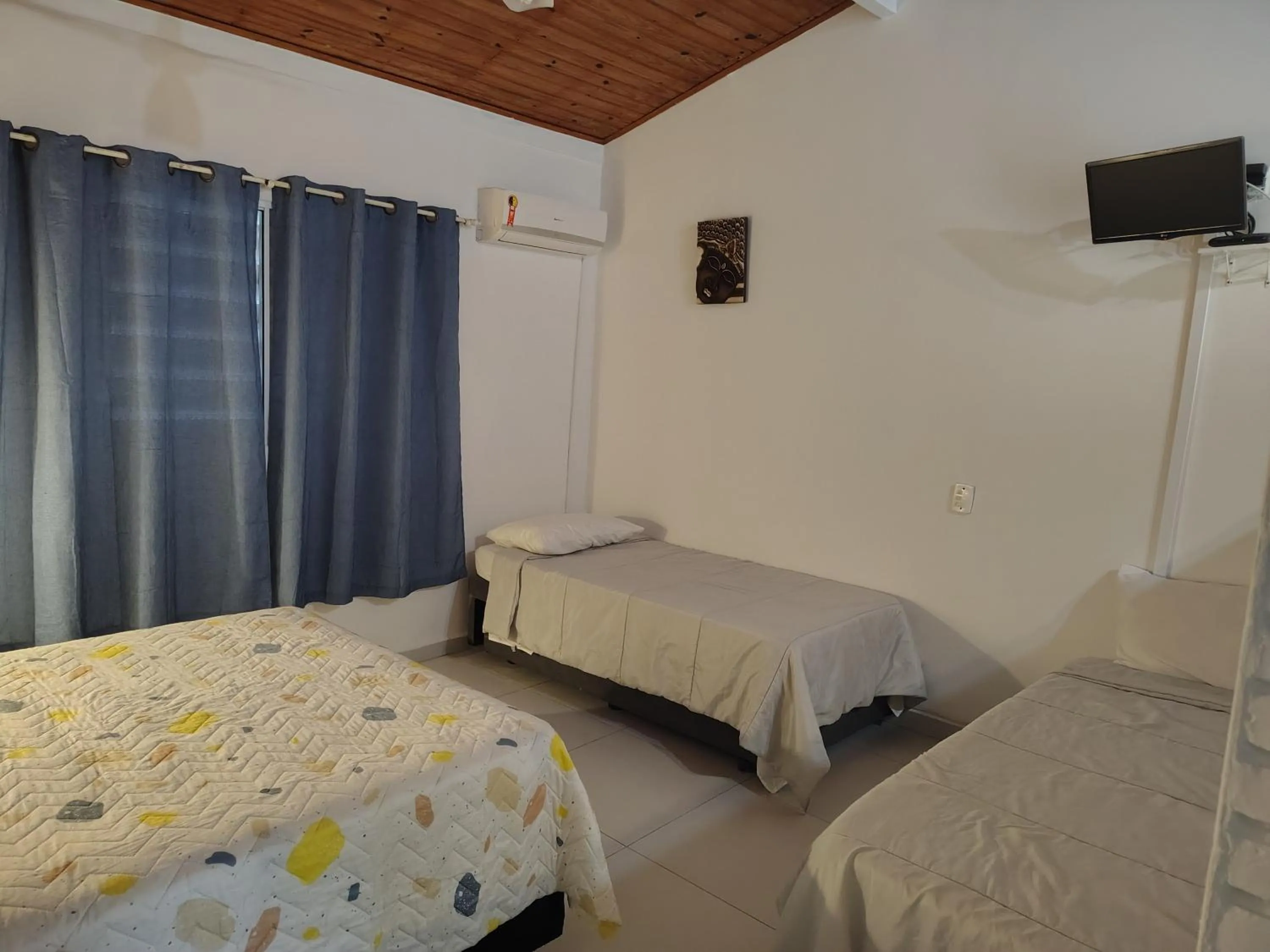 Bed in Villa Bali Maresias Lofts