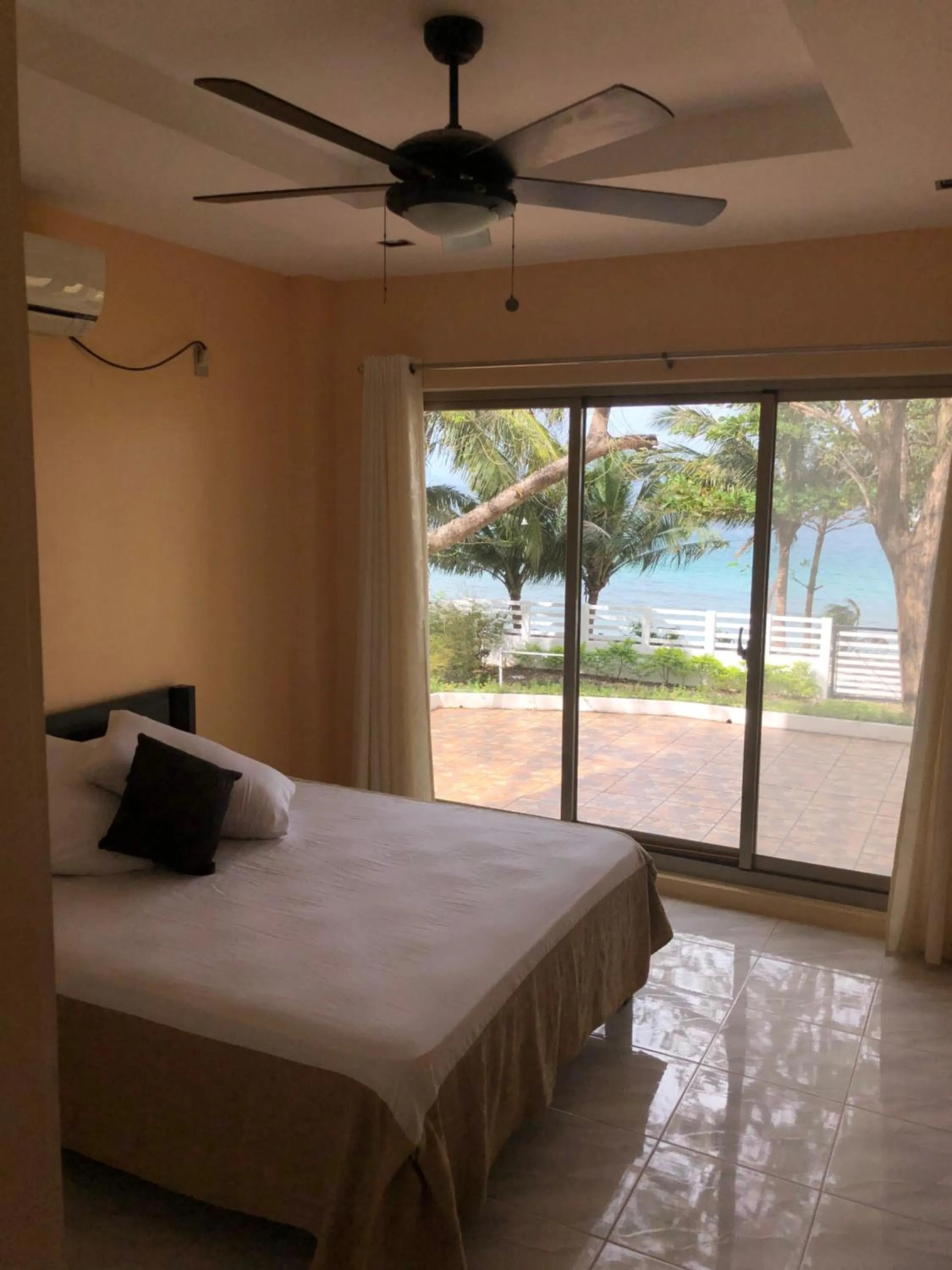 Bedroom, Bed in Amami Beachfront Villa with Private Beach