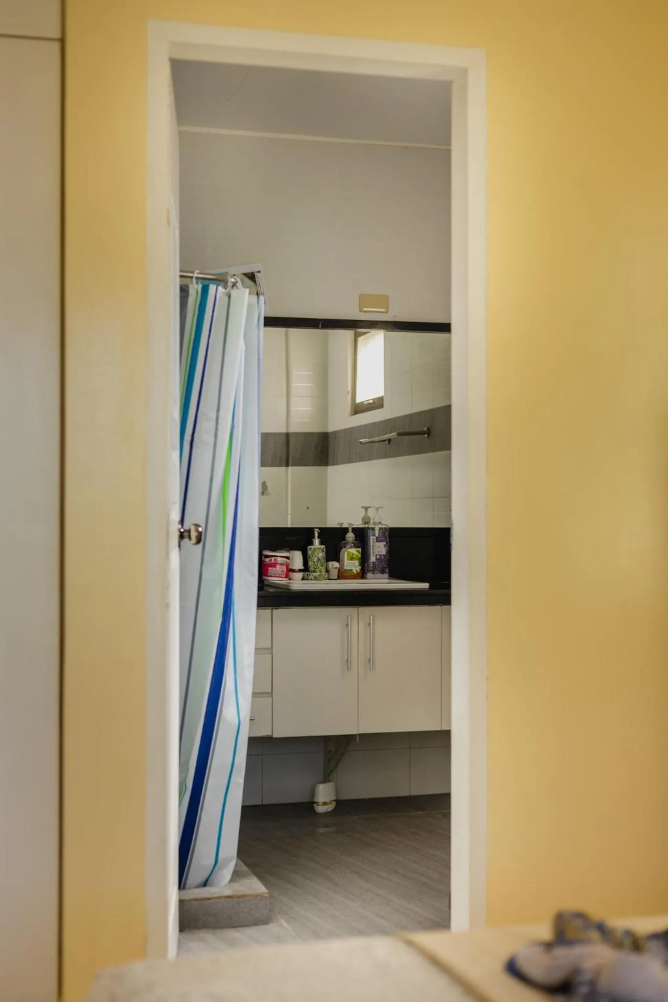 Shower in Amami Beachfront Villa with Private Beach