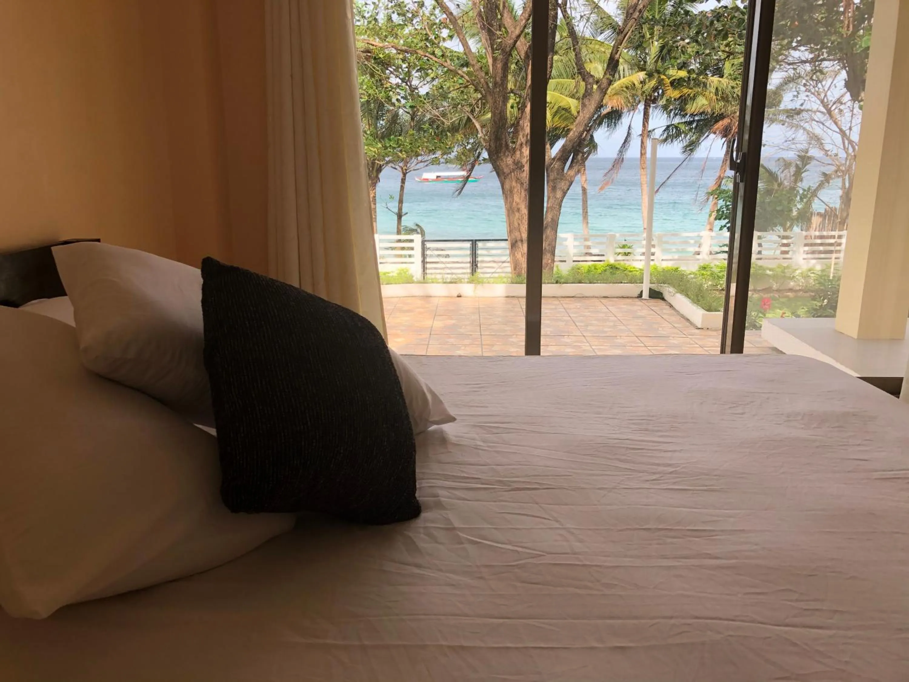 Bed in Amami Beachfront Villa with Private Beach